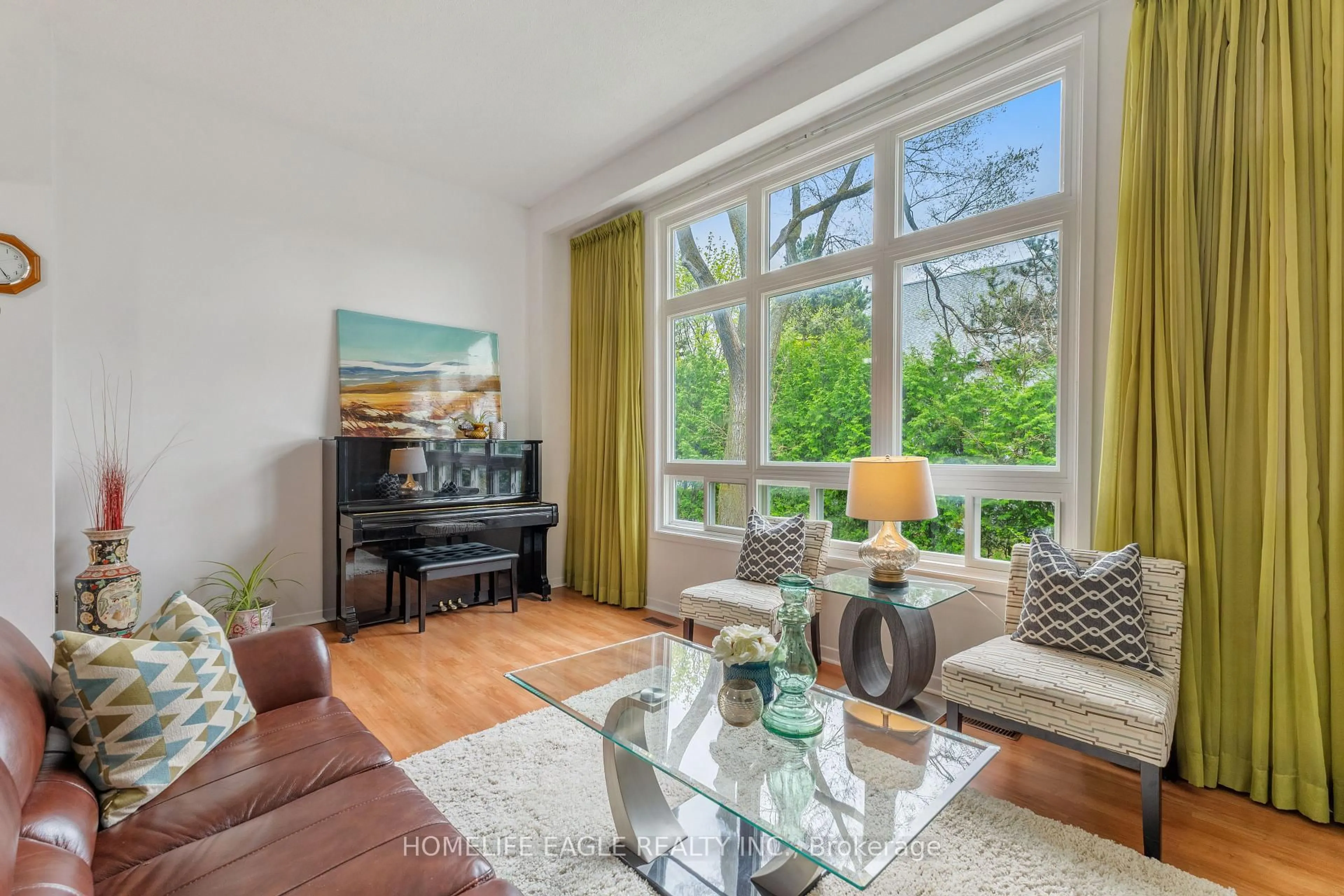 Living room with furniture, wood/laminate floor for 3000 Midland Ave #10, Toronto Ontario M1S 3T1