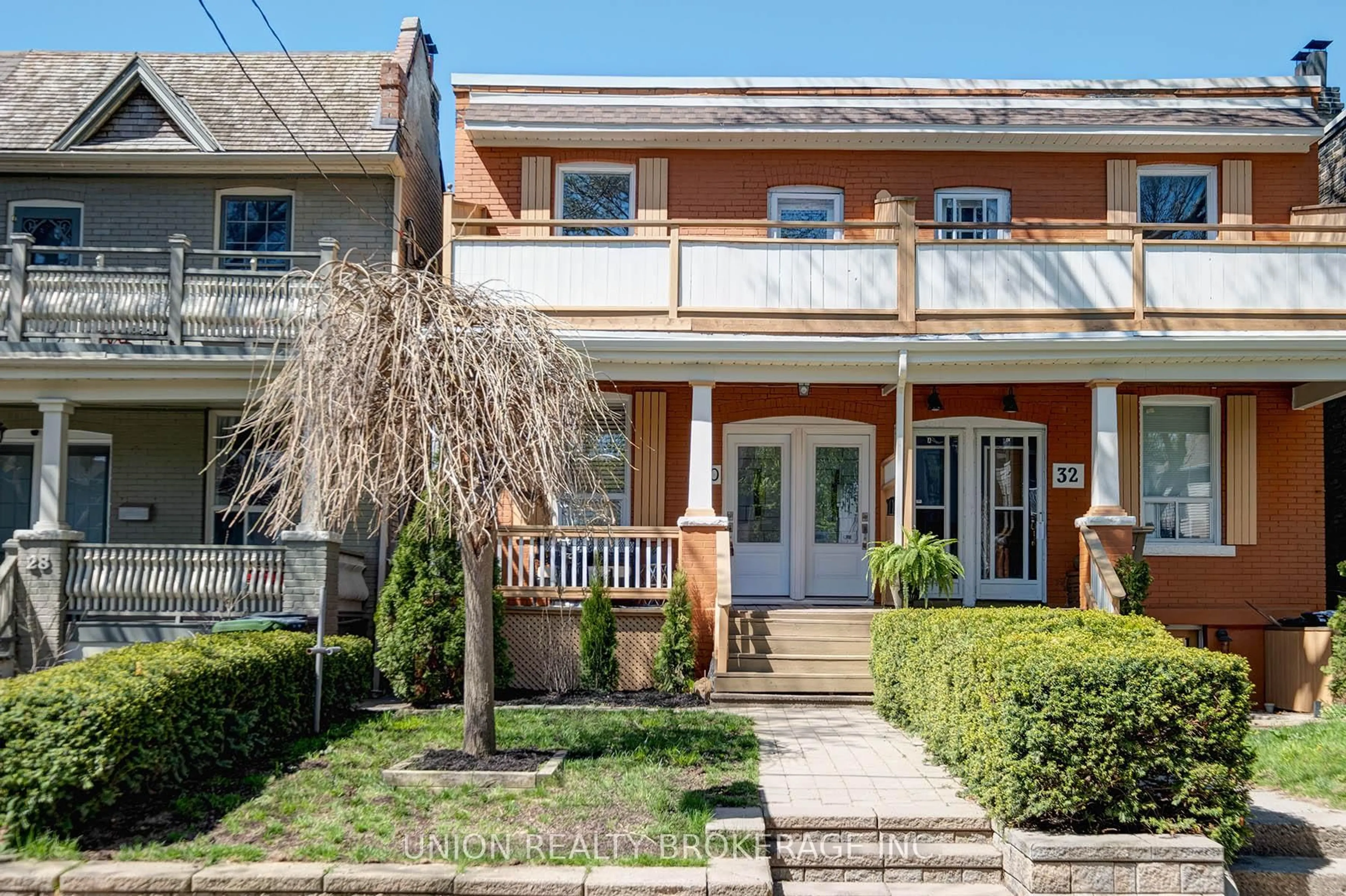 Home with brick exterior material, street for 30 Ashdale Ave, Toronto Ontario M4L 2Y7