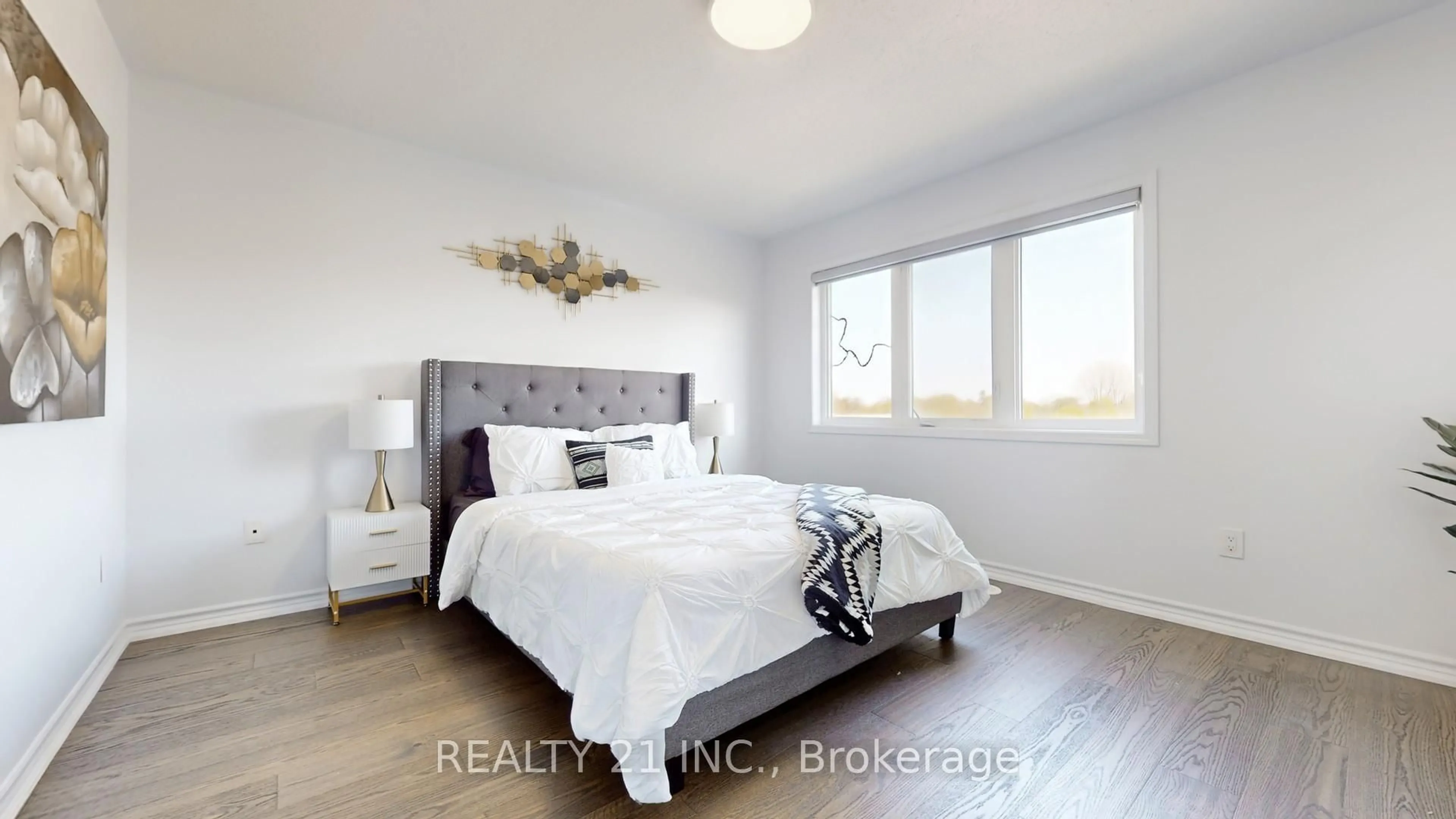 Bedroom with bed, wood/laminate floor for 42 Heron Park Pl Pl, Toronto Ontario M1E 0B8