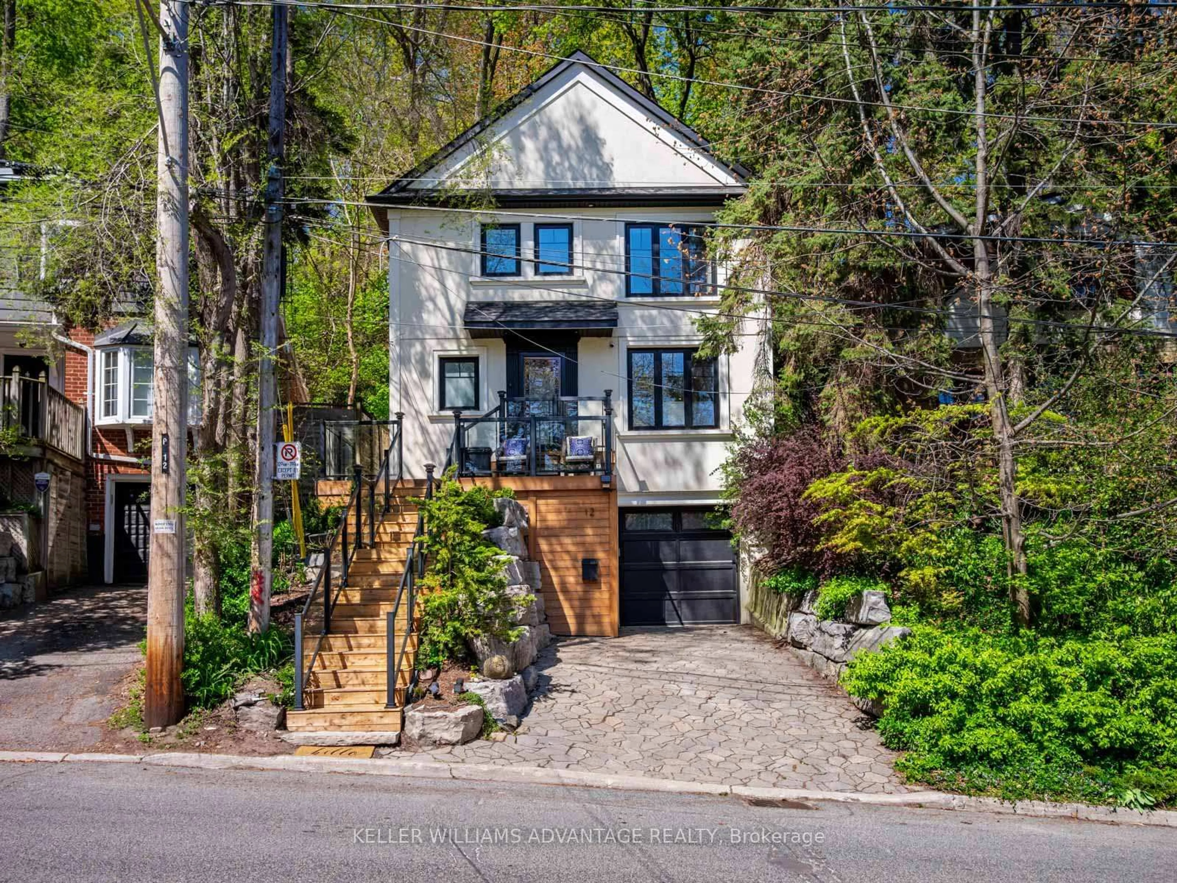 Home with brick exterior material, street for 12 Glen Davis Cres, Toronto Ontario M4E 1X5