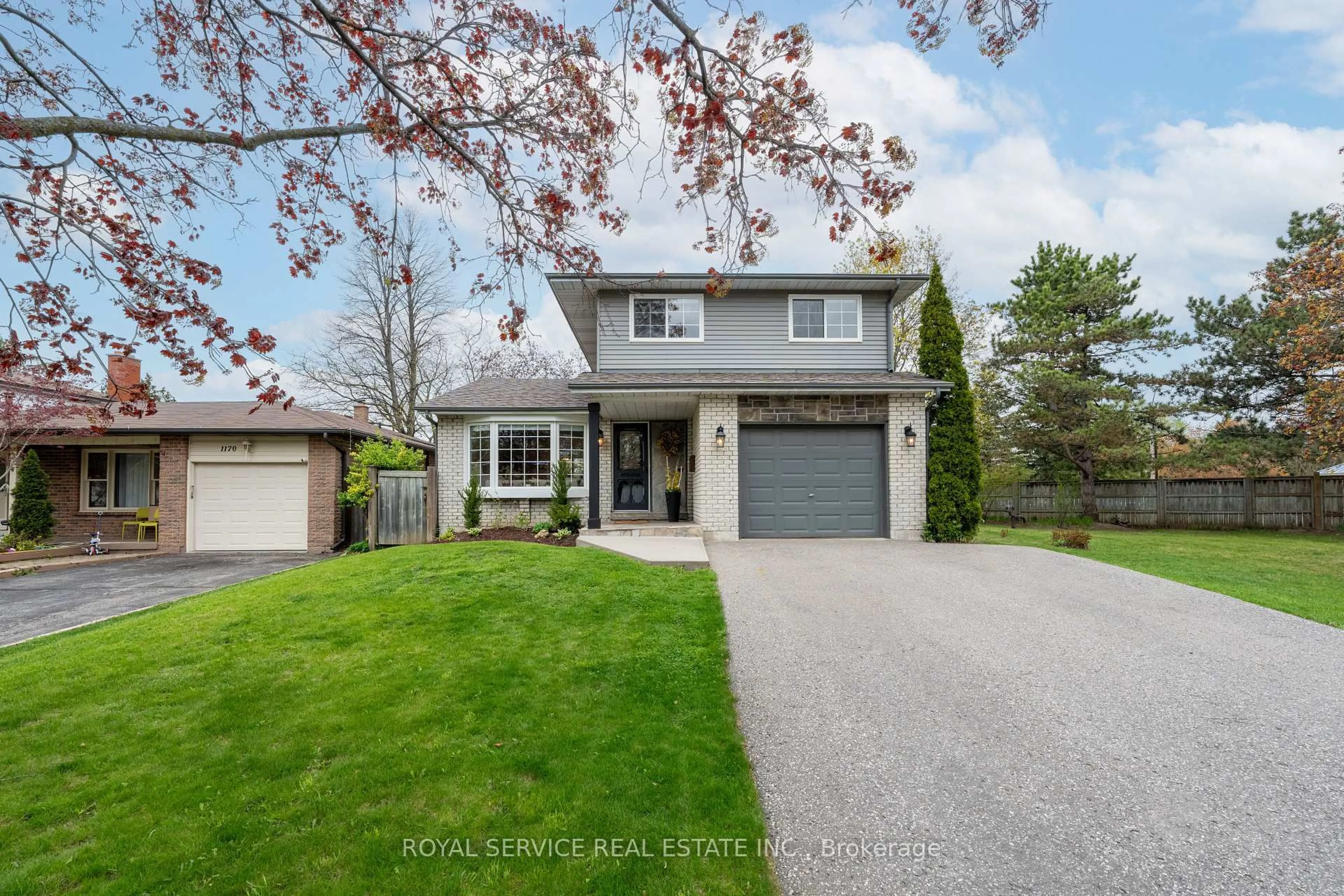 Home with vinyl exterior material, street for 1174 Trillium Crt, Oshawa Ontario L1G 7M2