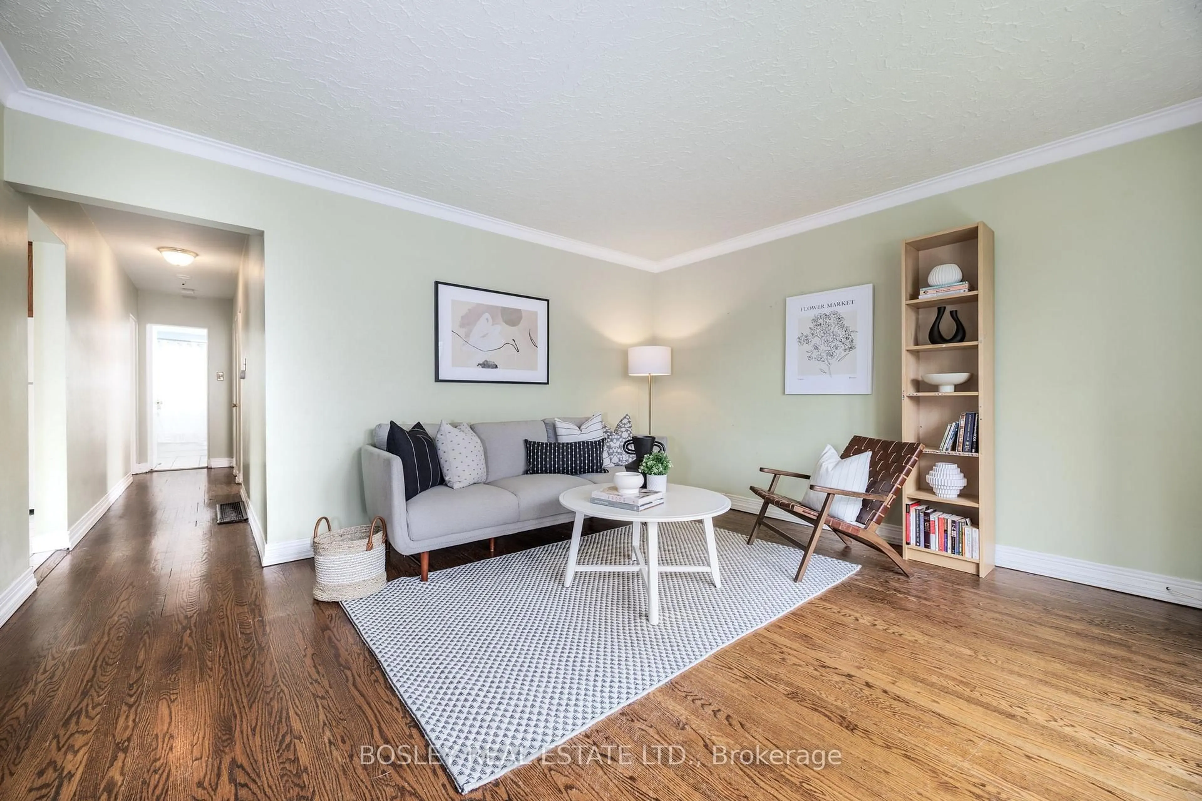 Living room with furniture, wood/laminate floor for 106 Brenda Cres, Toronto Ontario M1K 3L7