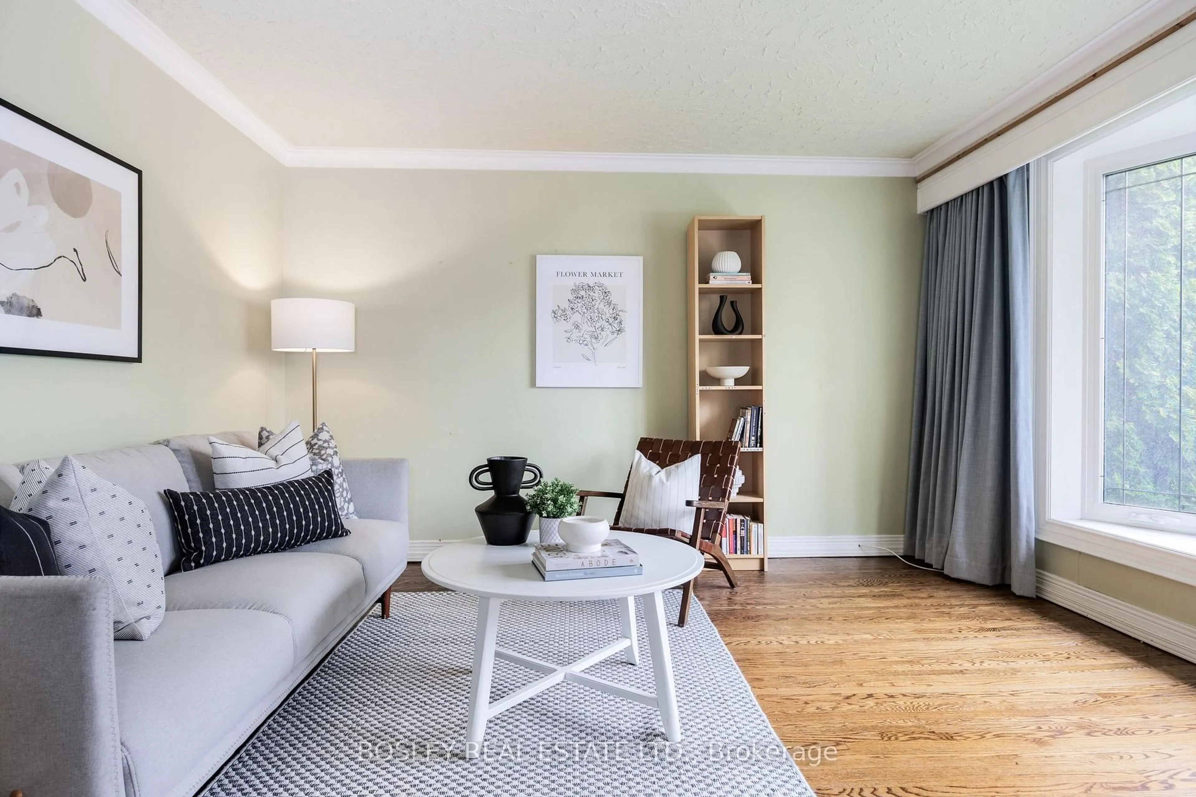 Living room with furniture, wood/laminate floor for 106 Brenda Cres, Toronto Ontario M1K 3L7