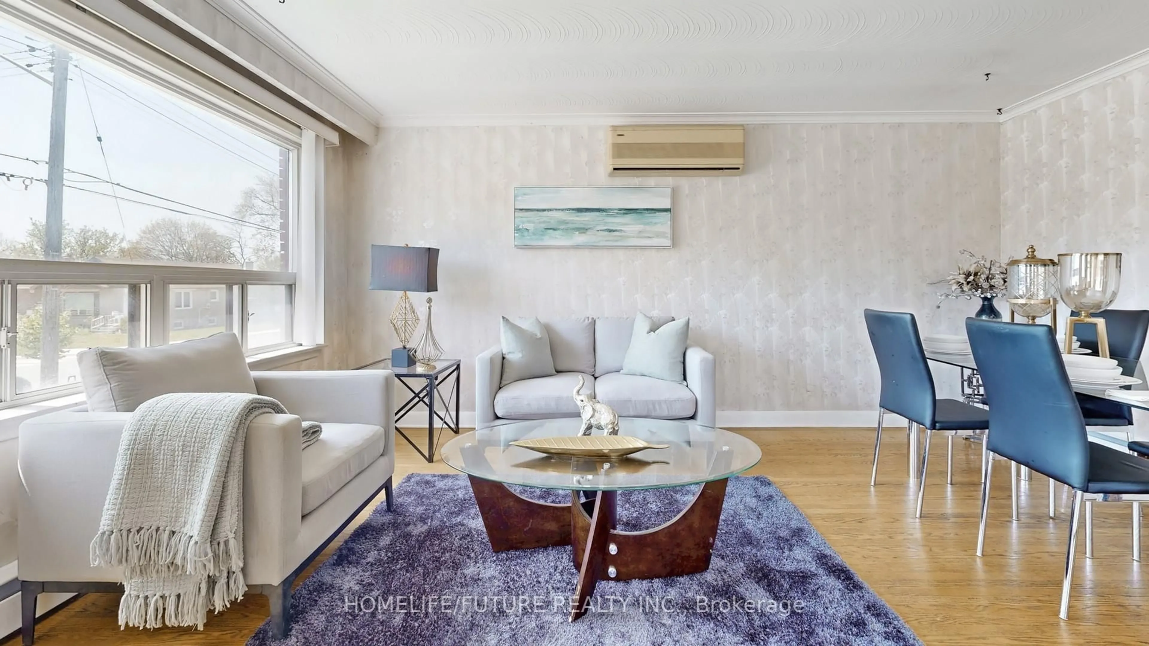 Living room with furniture, wood/laminate floor for 164 Bertrand Ave, Toronto Ontario M1K 2T2