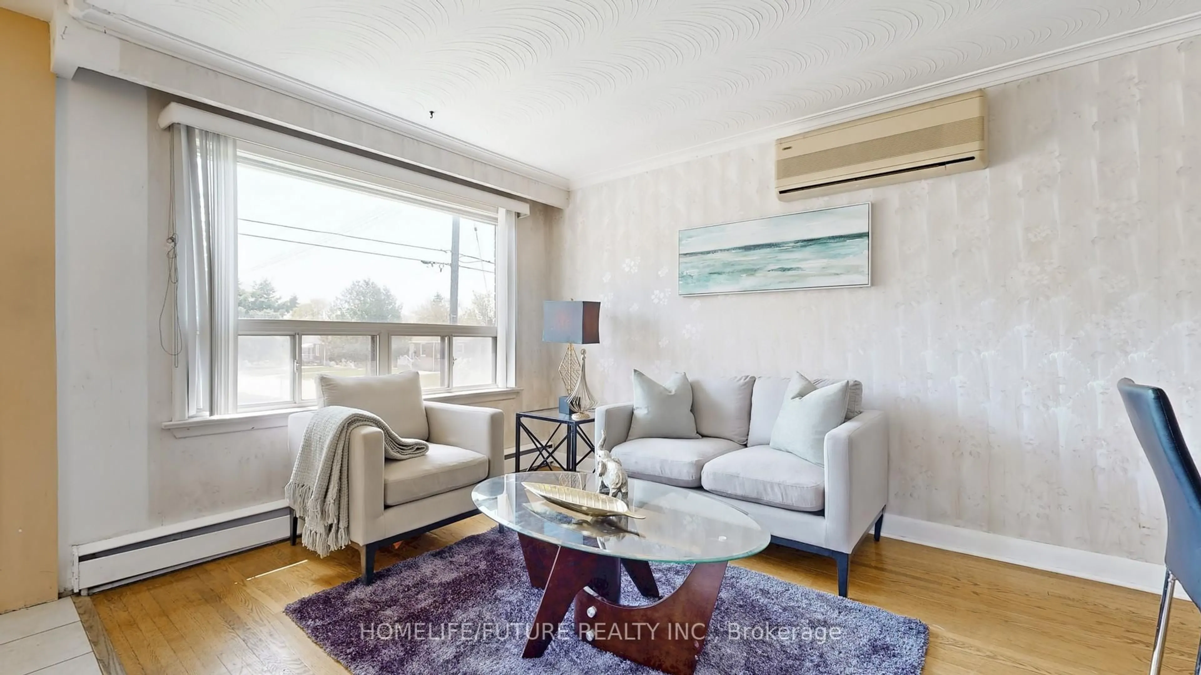 Living room with furniture, wood/laminate floor for 164 Bertrand Ave, Toronto Ontario M1K 2T2