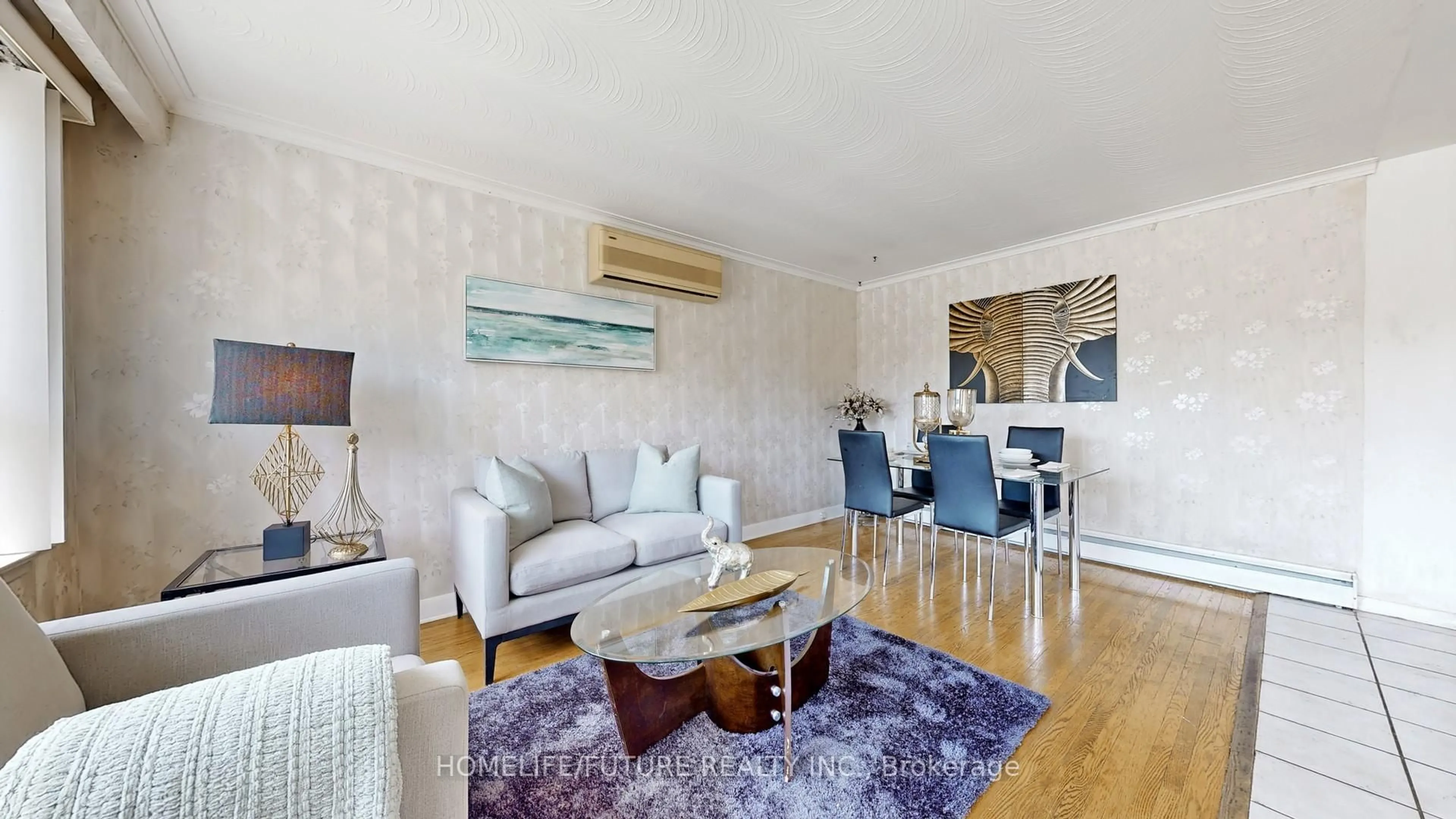 Living room with furniture, wood/laminate floor for 164 Bertrand Ave, Toronto Ontario M1K 2T2