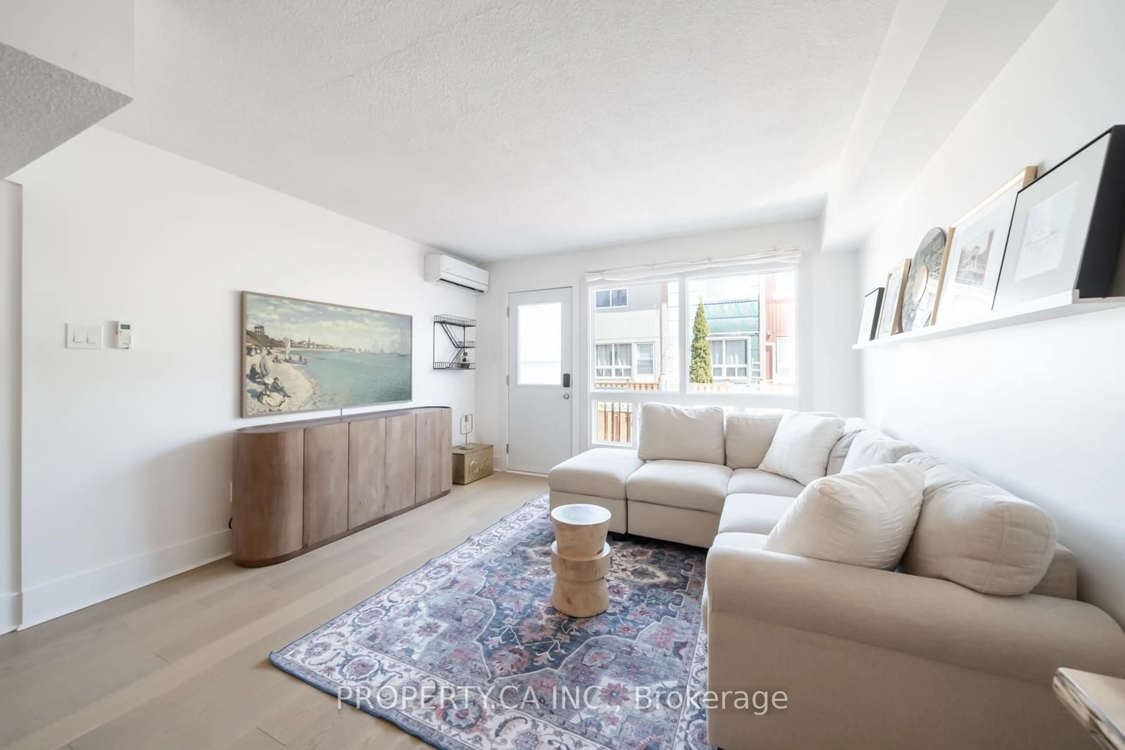 Living room with furniture, unknown for 1209 Queen St #30, Toronto Ontario M4M 3H4