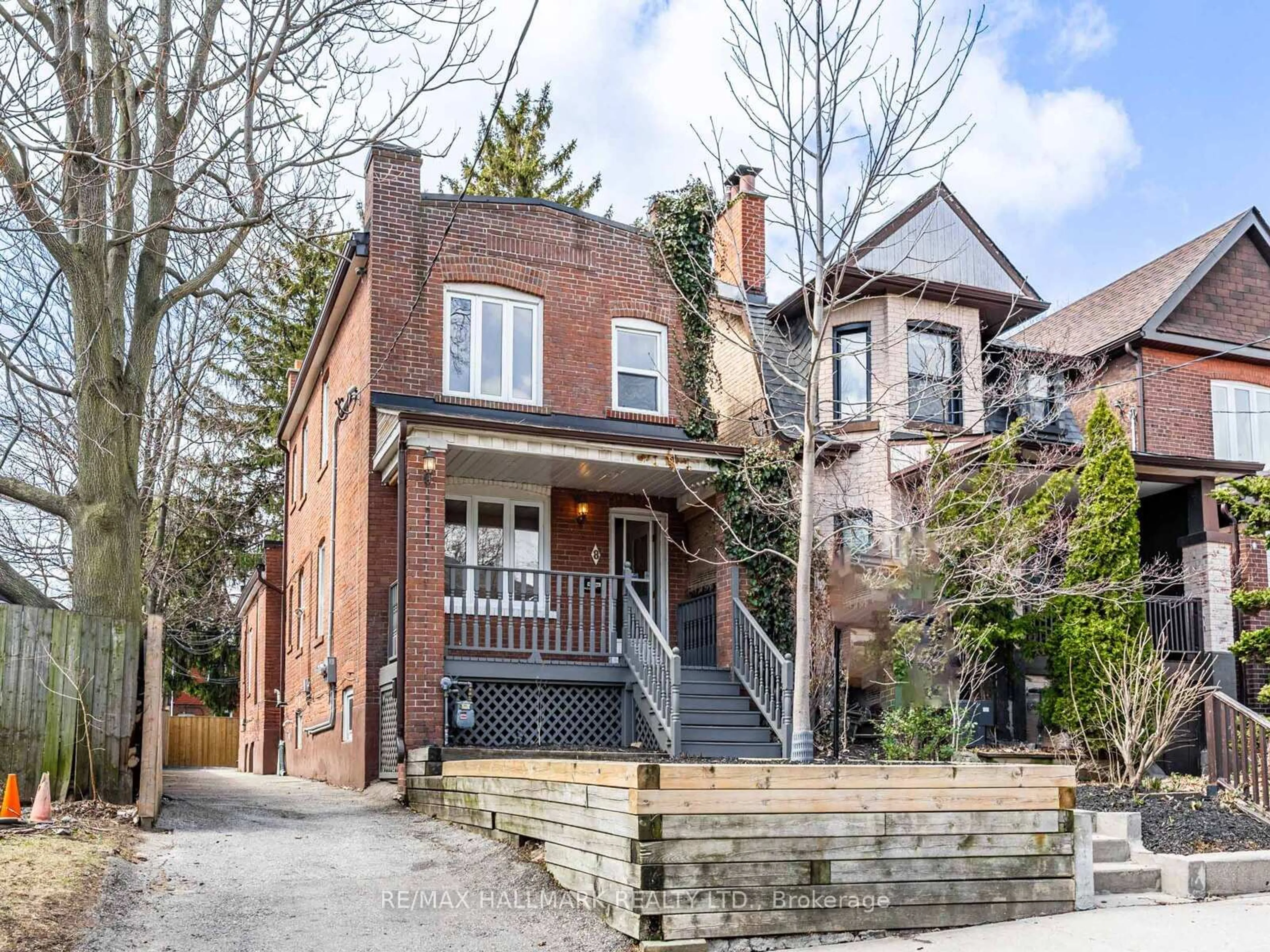 Home with brick exterior material, street for 8 Redwood Ave, Toronto Ontario M4L 2S6