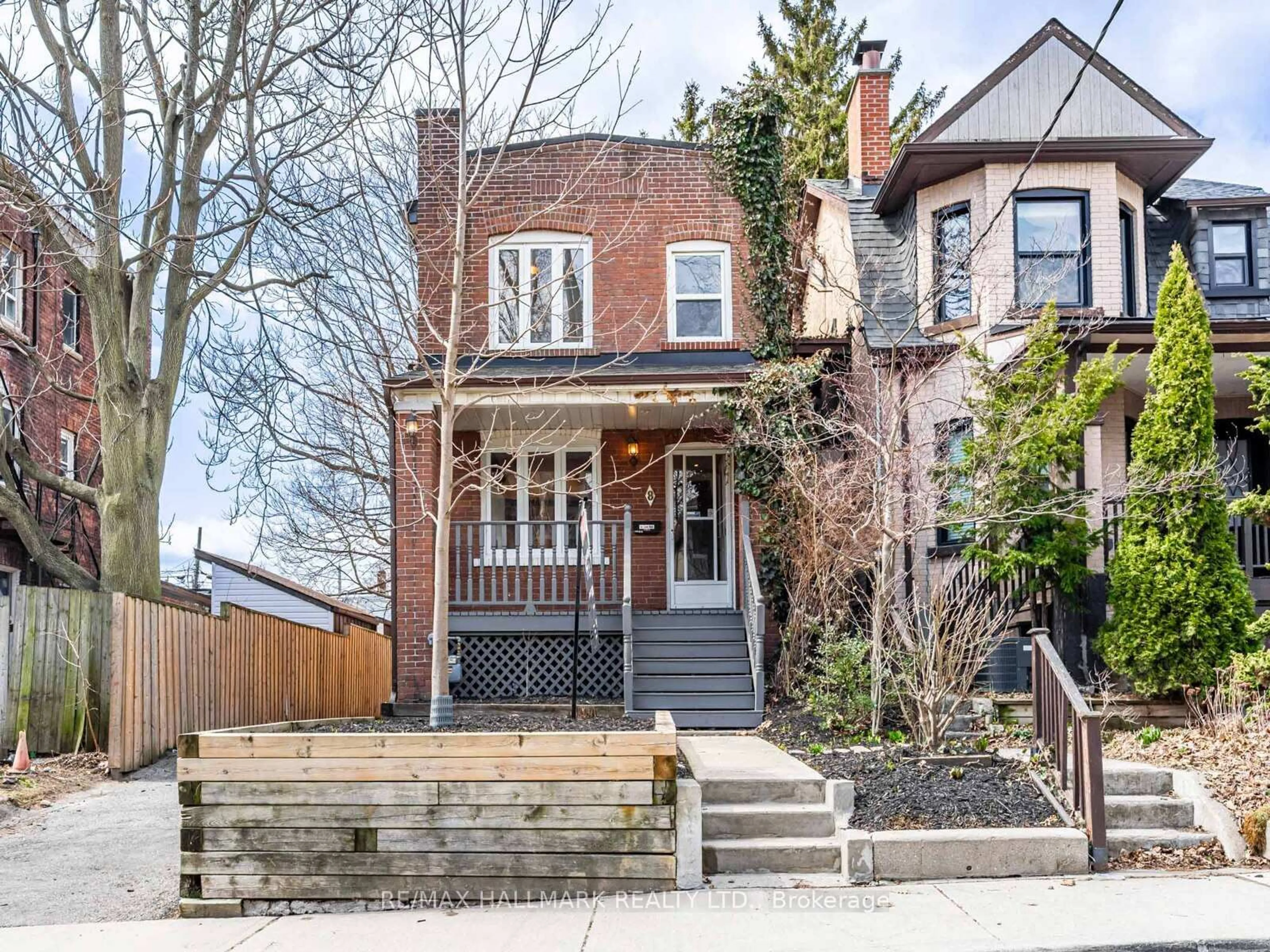 Home with brick exterior material, street for 8 Redwood Ave, Toronto Ontario M4L 2S6