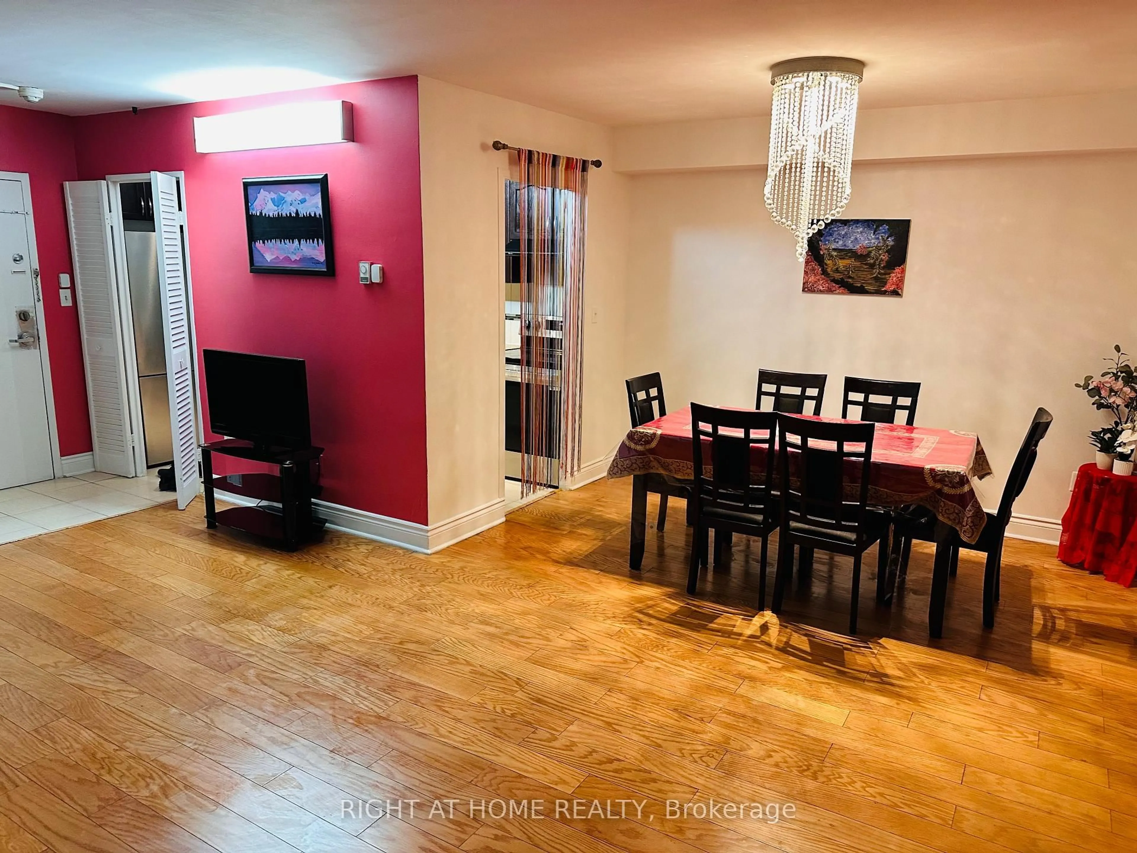Dining room, wood/laminate floor for 5 Massey Sq #1204, Toronto Ontario M4C 5L6