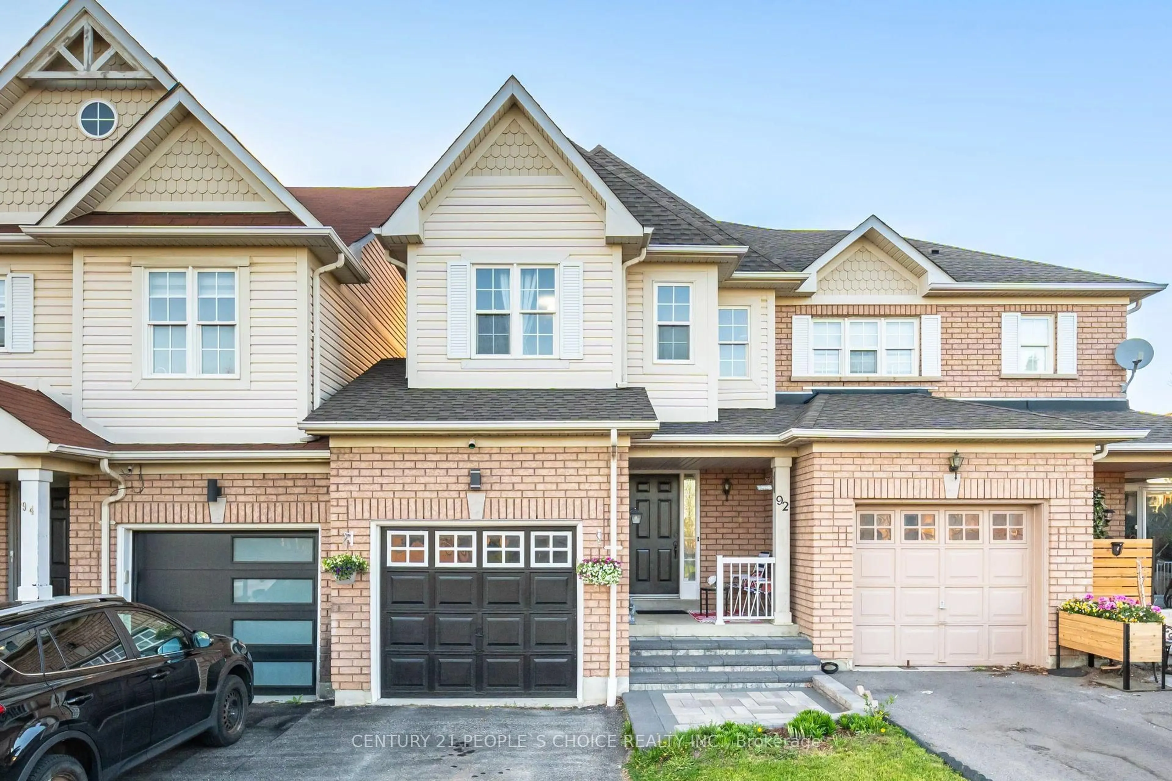 Home with brick exterior material, street for 92 Kirkland Pl, Whitby Ontario L1P 1X1
