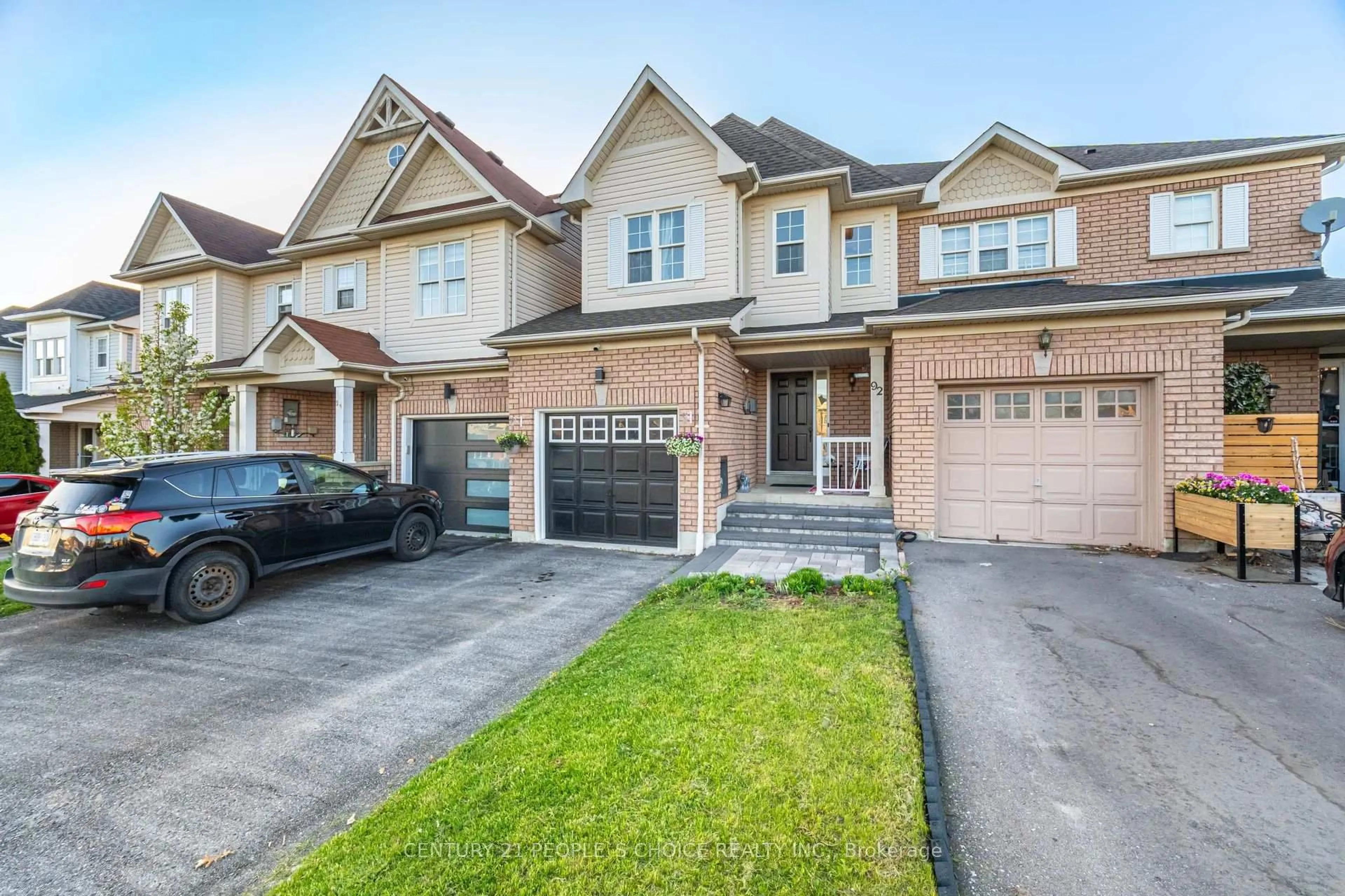 Home with brick exterior material, street for 92 Kirkland Pl, Whitby Ontario L1P 1X1