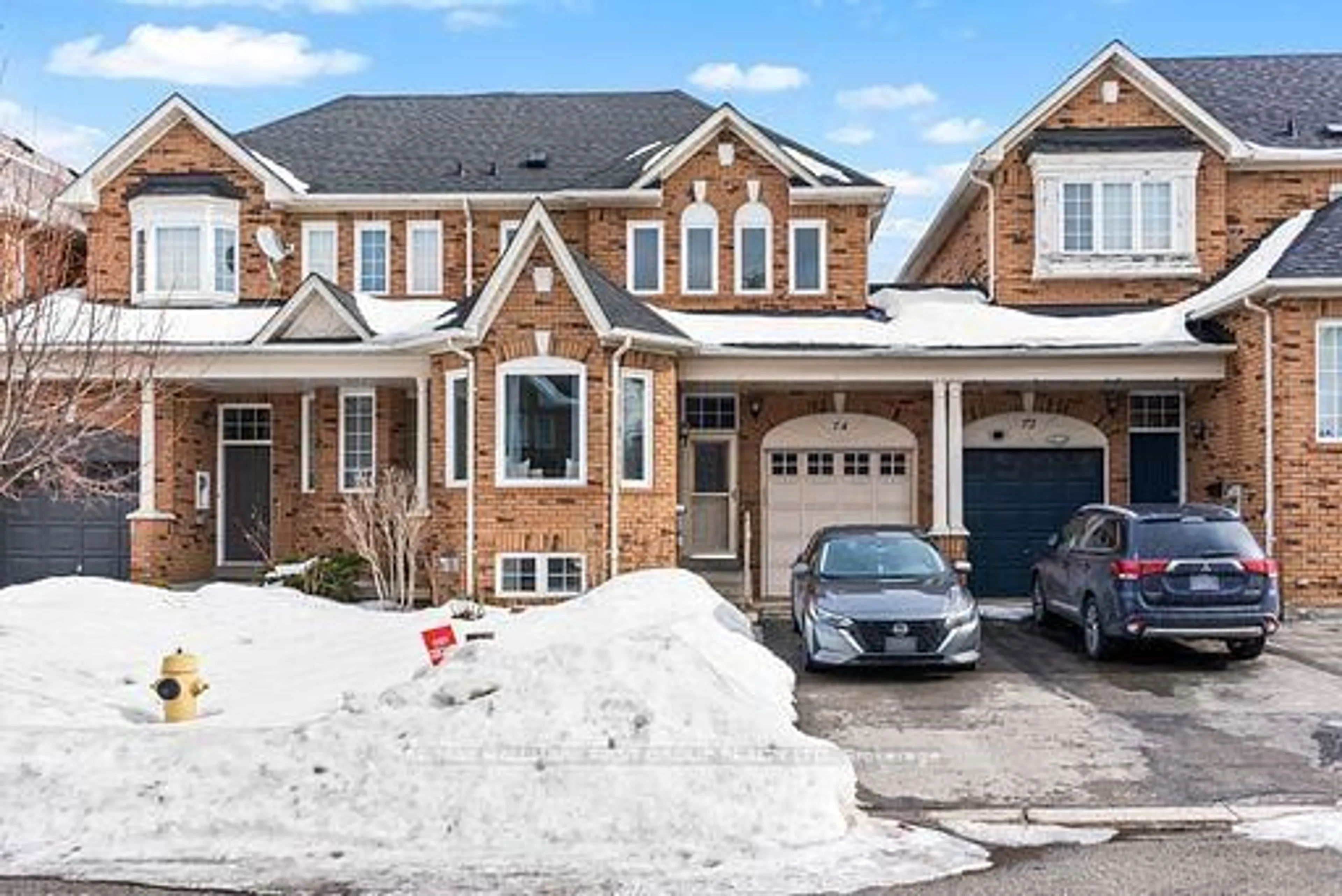 Home with brick exterior material, street for 74 Dooley Cres, Ajax Ontario L1T 4J2