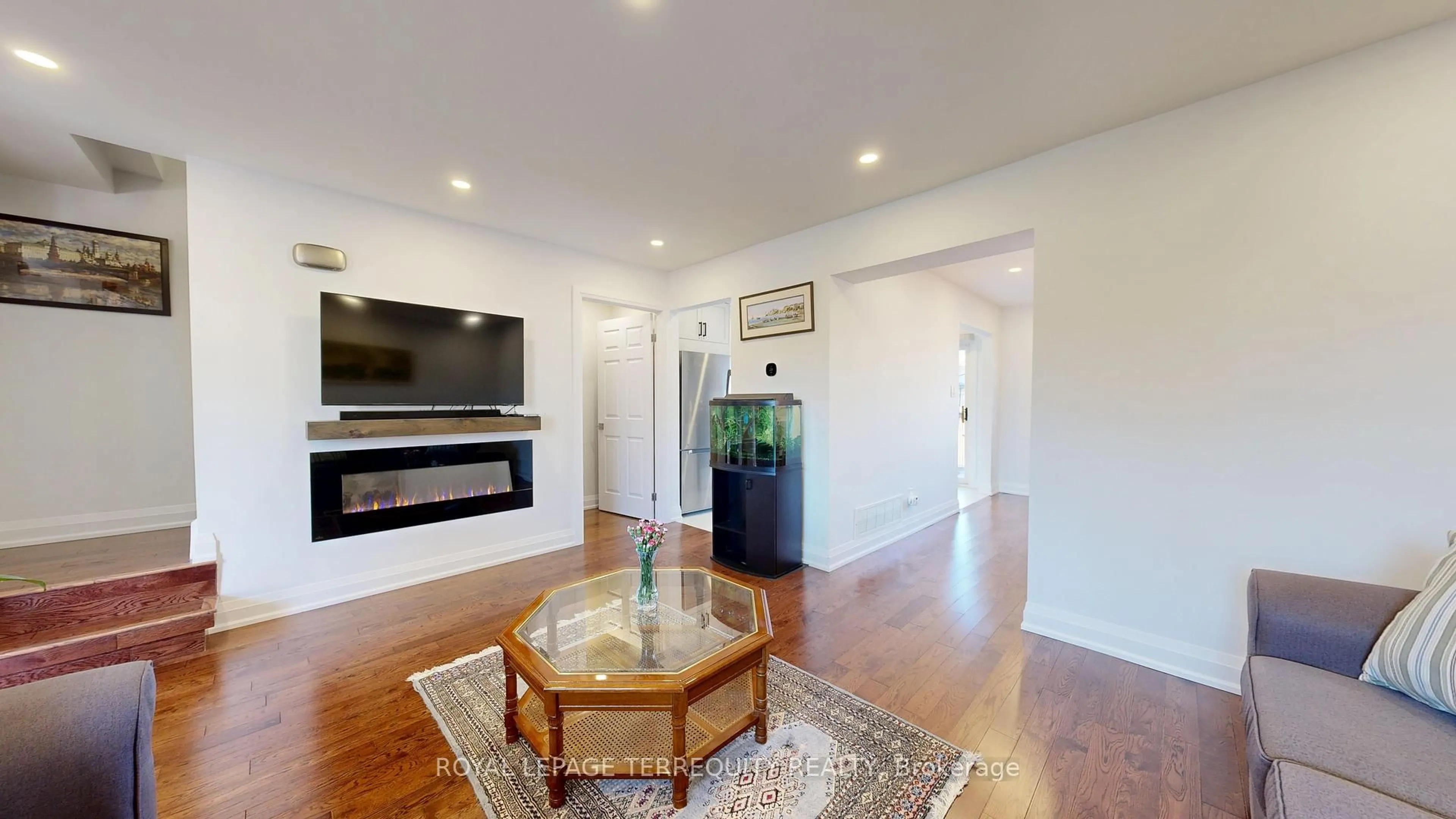 Living room with furniture, wood/laminate floor for 68 Phalen Cres, Toronto Ontario M1V 1Y6