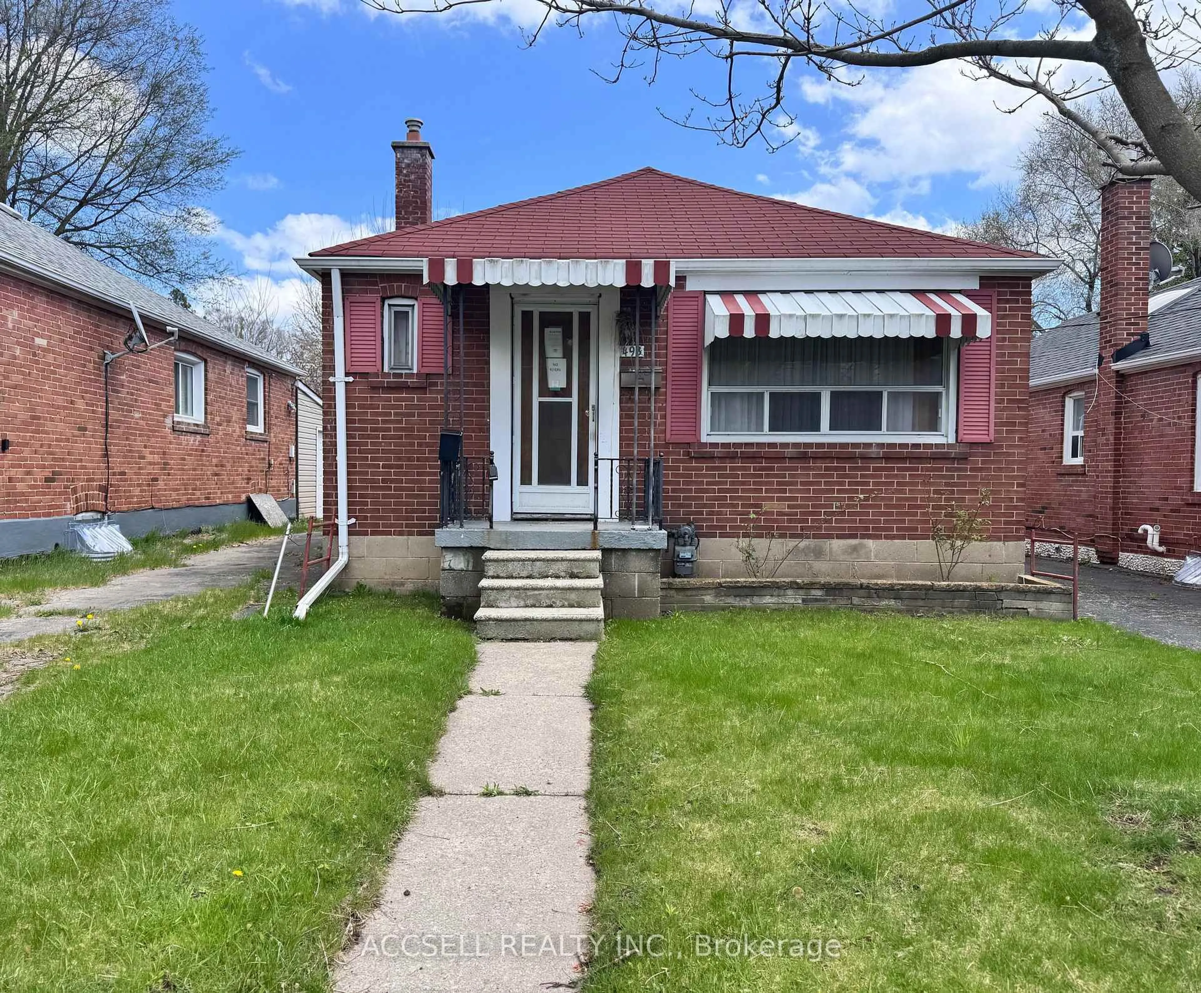 Home with brick exterior material, street for 493 Dawes Rd, Toronto Ontario M4B 2G5