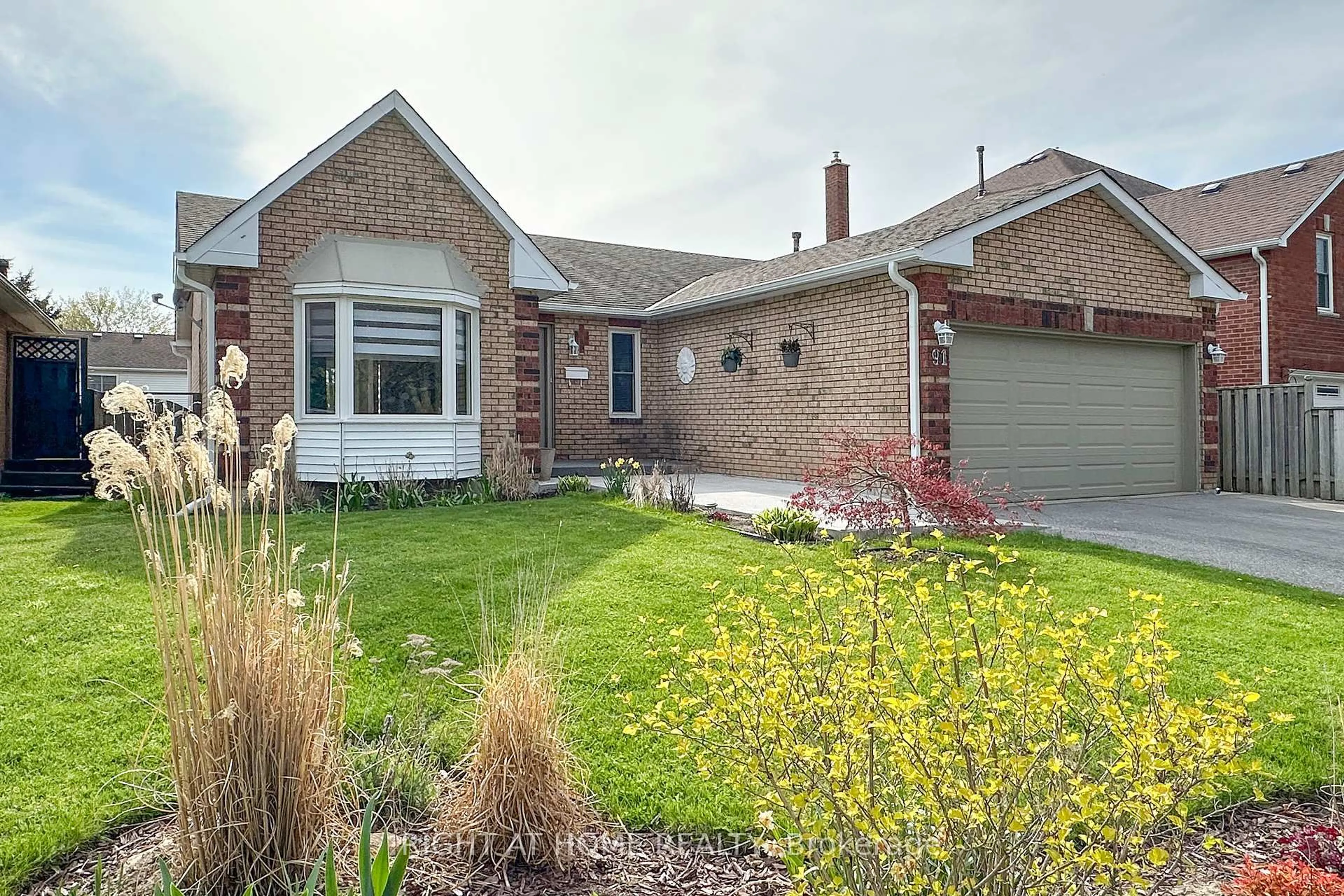 Home with brick exterior material, street for 91 Foster Creek Dr, Clarington Ontario L1B 1G5
