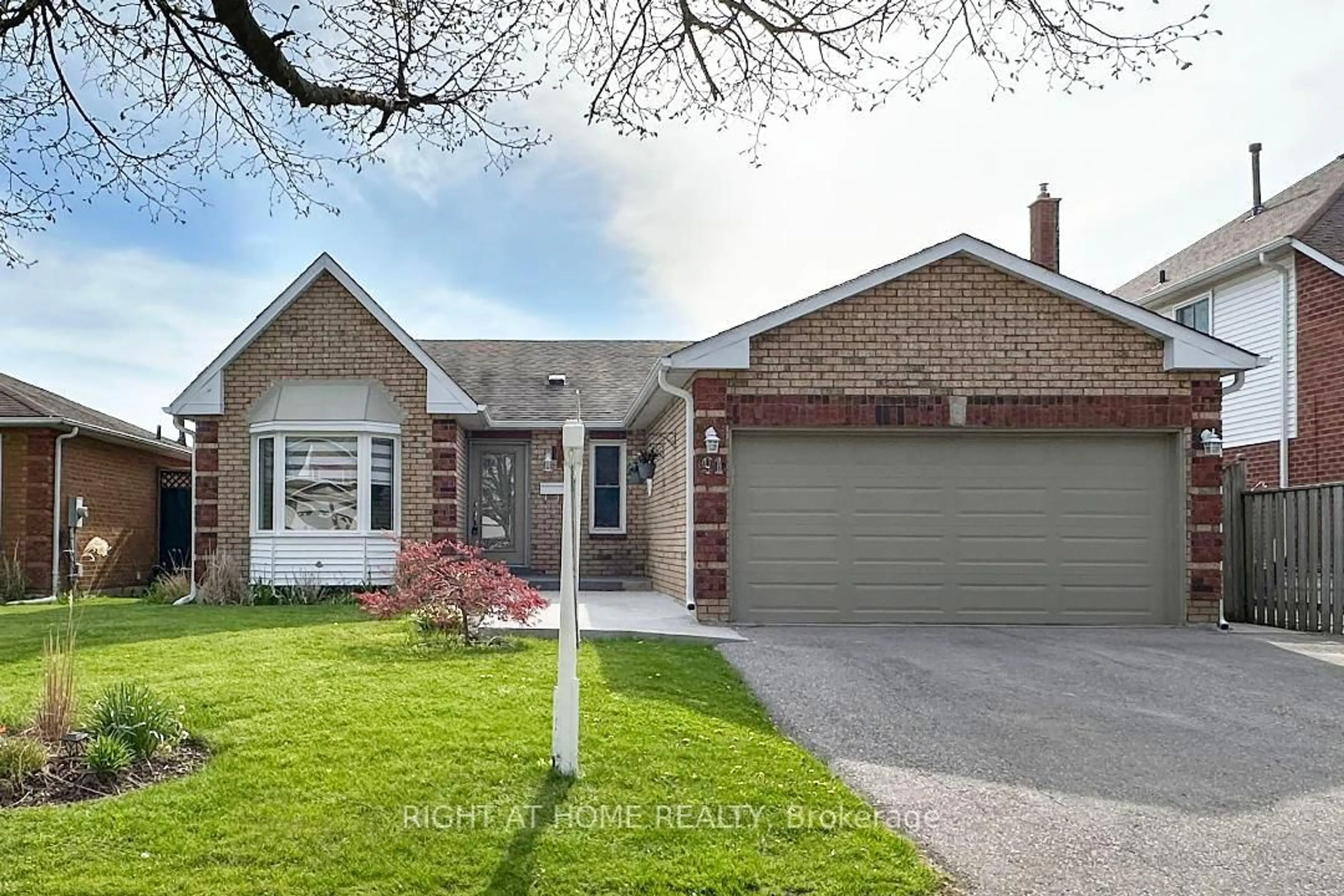 Home with brick exterior material, street for 91 Foster Creek Dr, Clarington Ontario L1B 1G5
