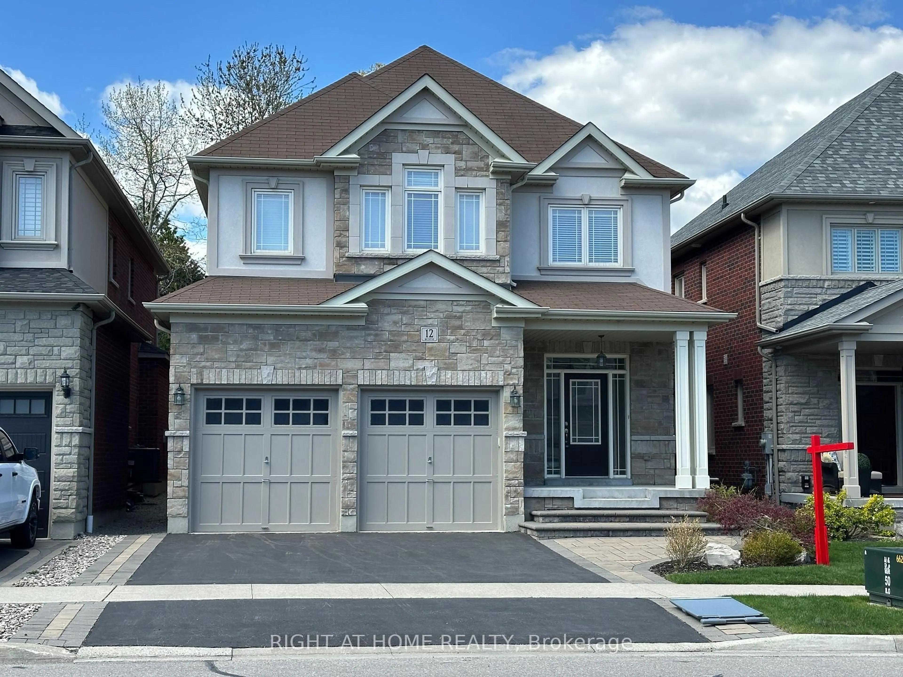 Home with brick exterior material, street for 12 Promenade Dr, Whitby Ontario L1R 0L4