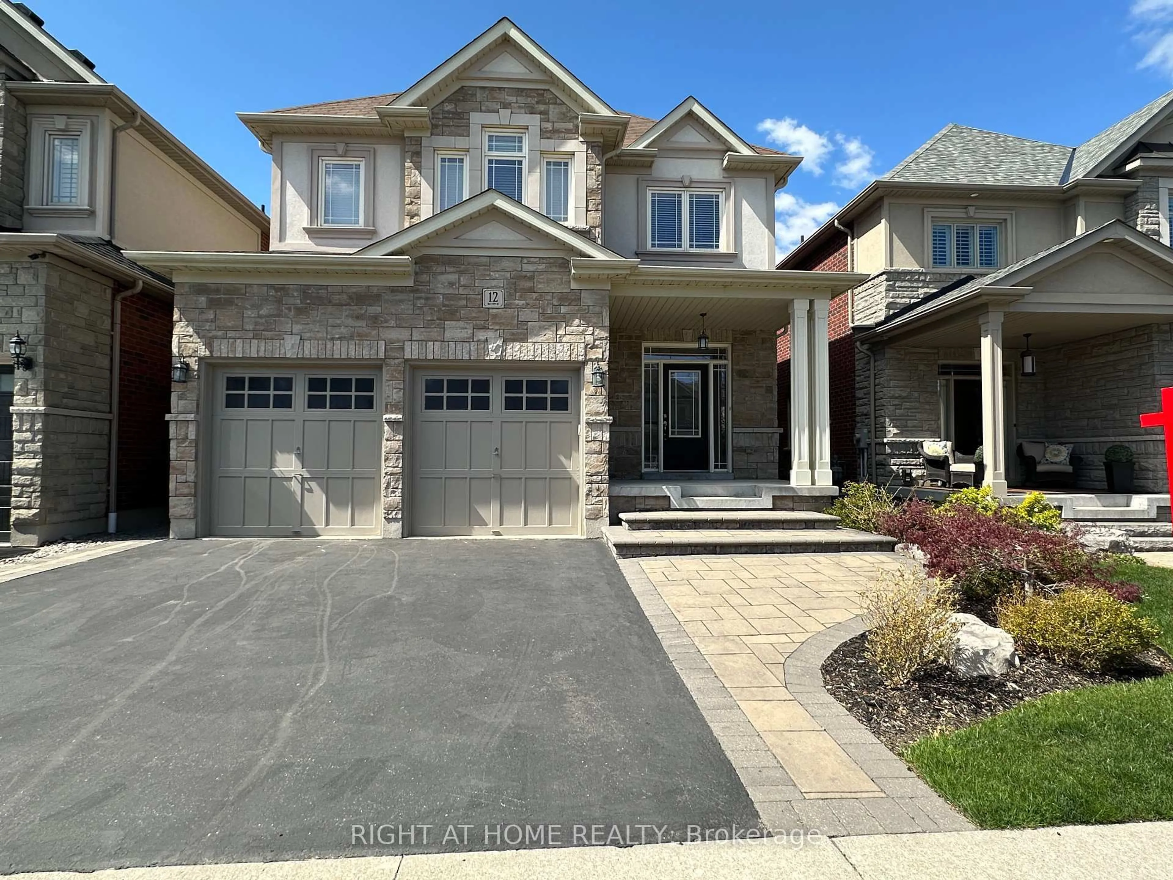 Home with brick exterior material, street for 12 Promenade Dr, Whitby Ontario L1R 0L4