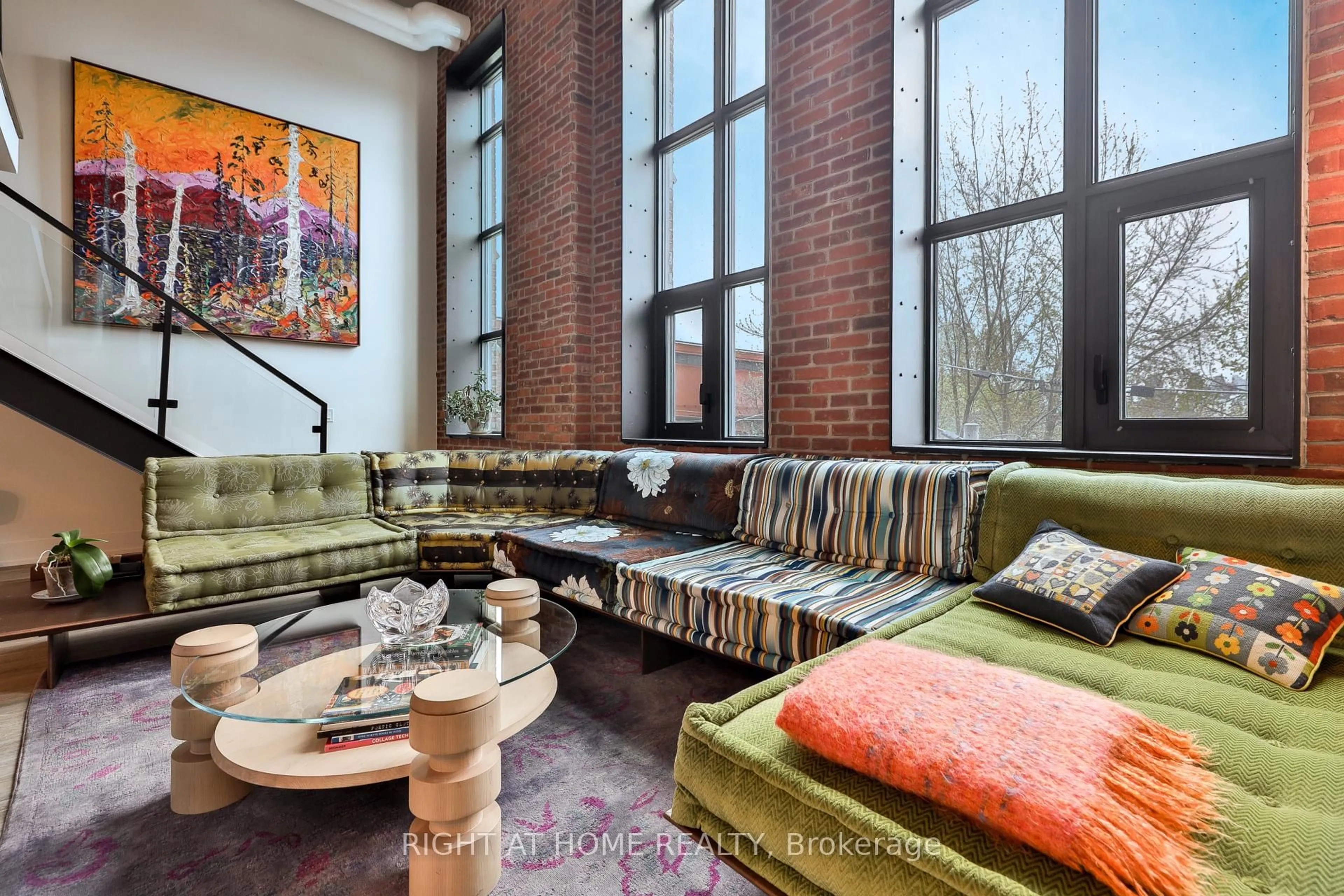 Living room with furniture, unknown for 150 Logan Ave #409, Toronto Ontario M4M 0E4