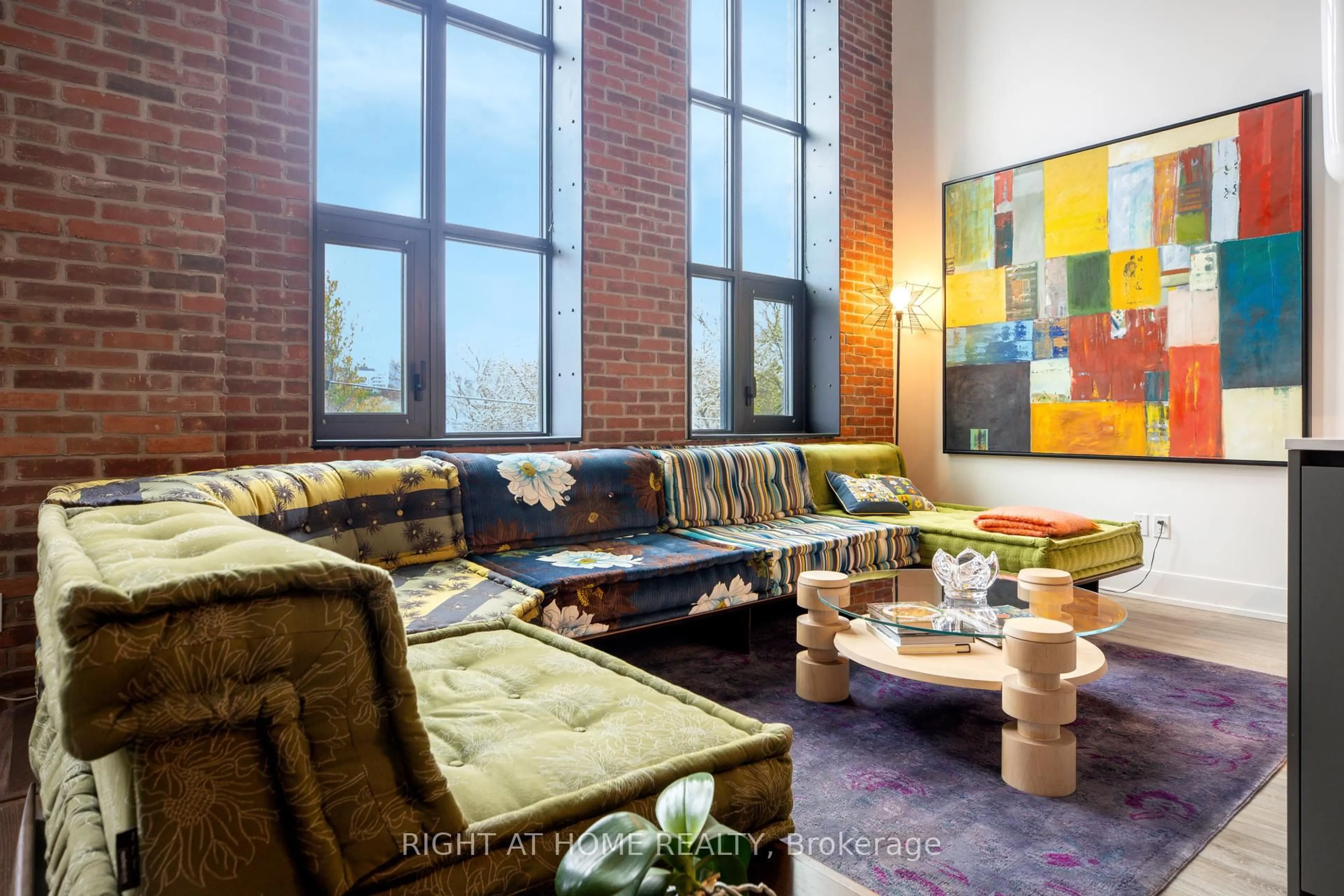 Living room with furniture, unknown for 150 Logan Ave #409, Toronto Ontario M4M 0E4