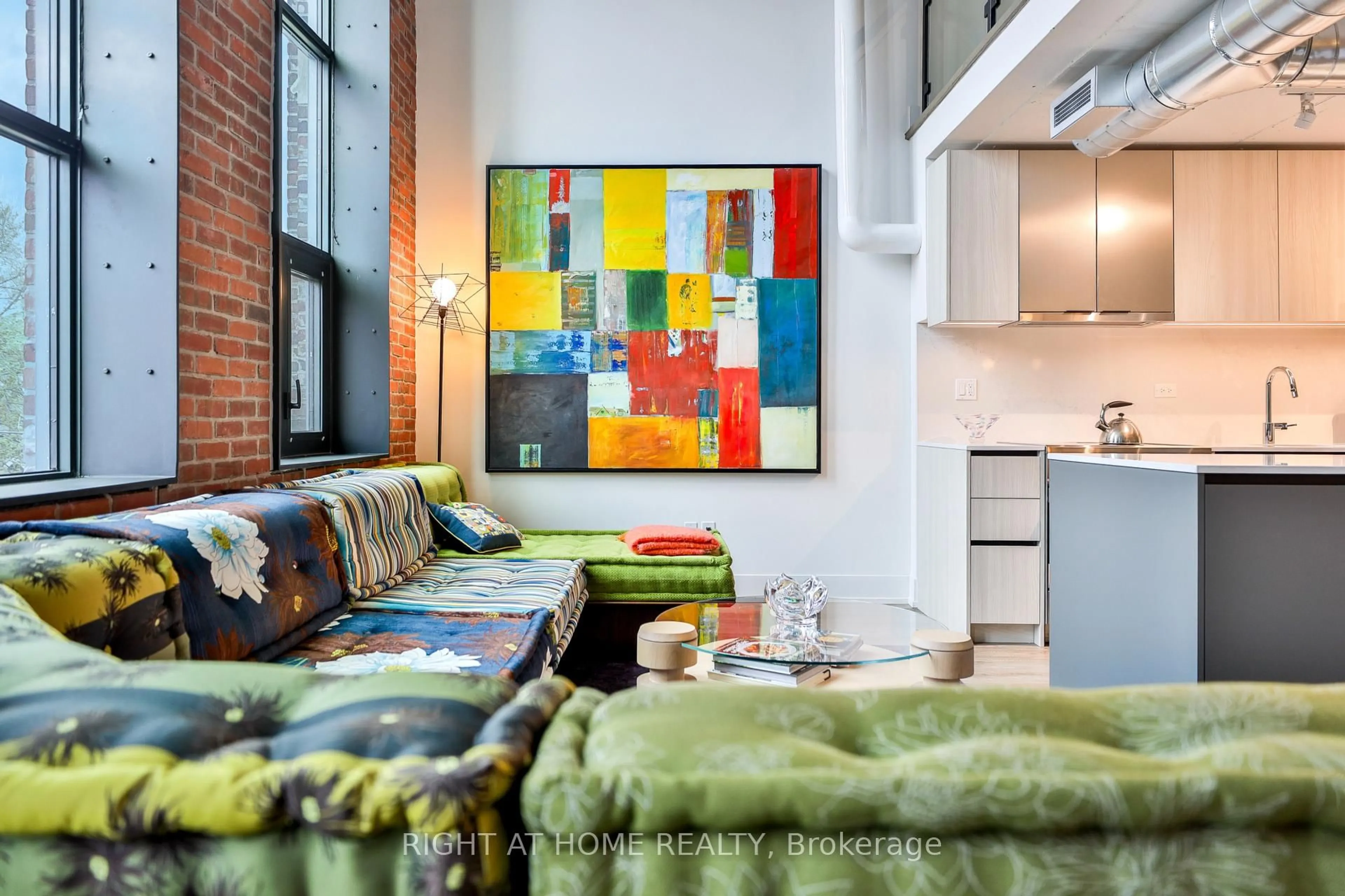 Living room with furniture, unknown for 150 Logan Ave #409, Toronto Ontario M4M 0E4