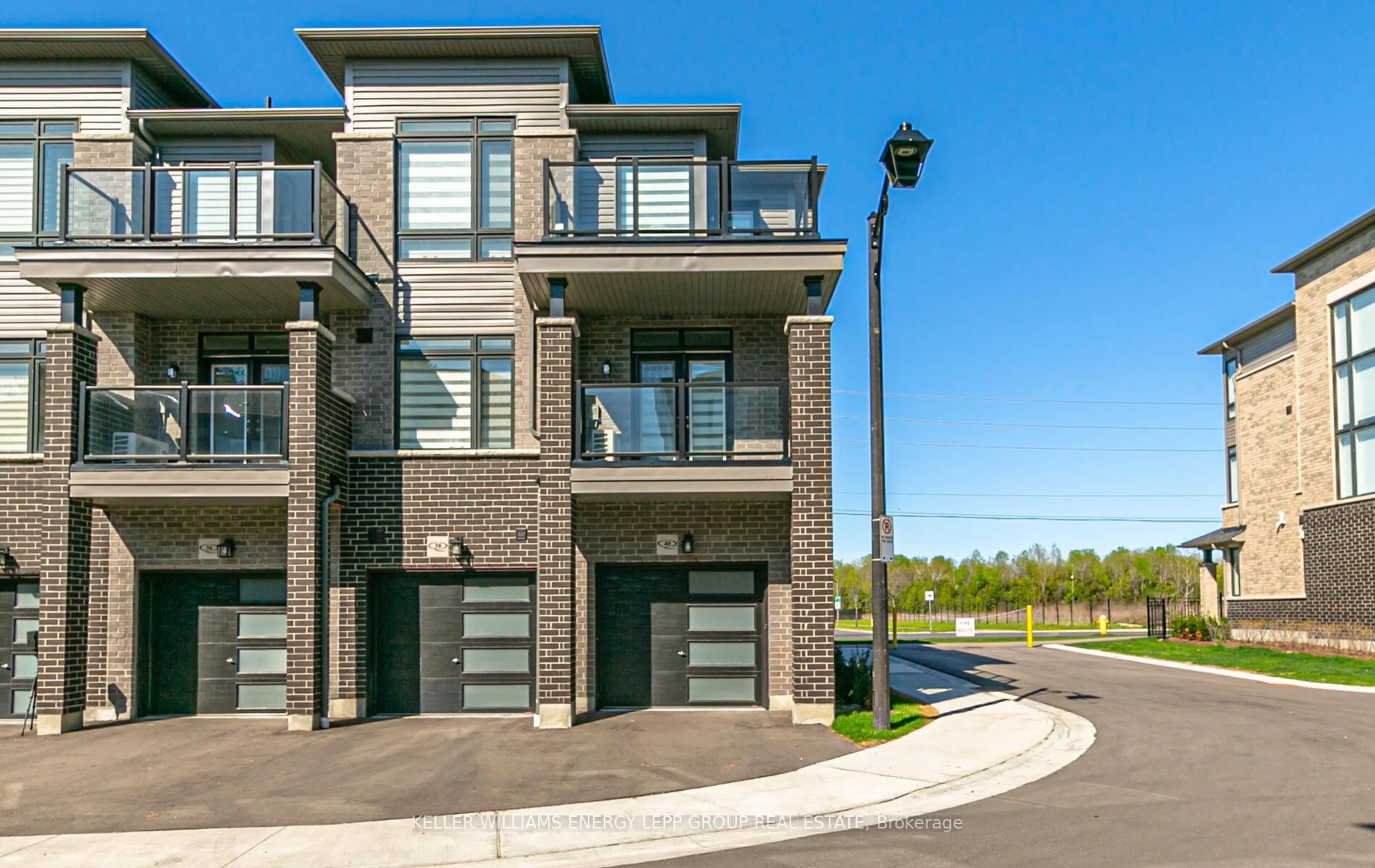 Home with brick exterior material, street for 40 Emmas Way, Whitby Ontario L1R 0S7