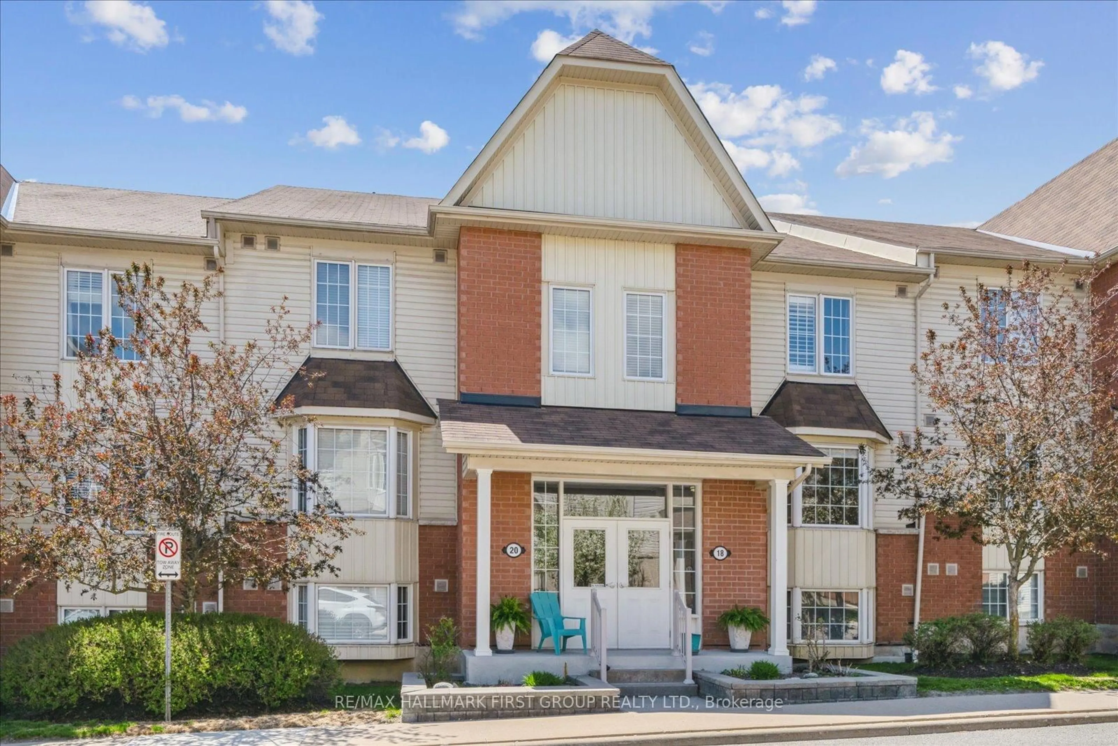 Home with brick exterior material, street for 20 Petra Way #1, Whitby Ontario L1R 0A5