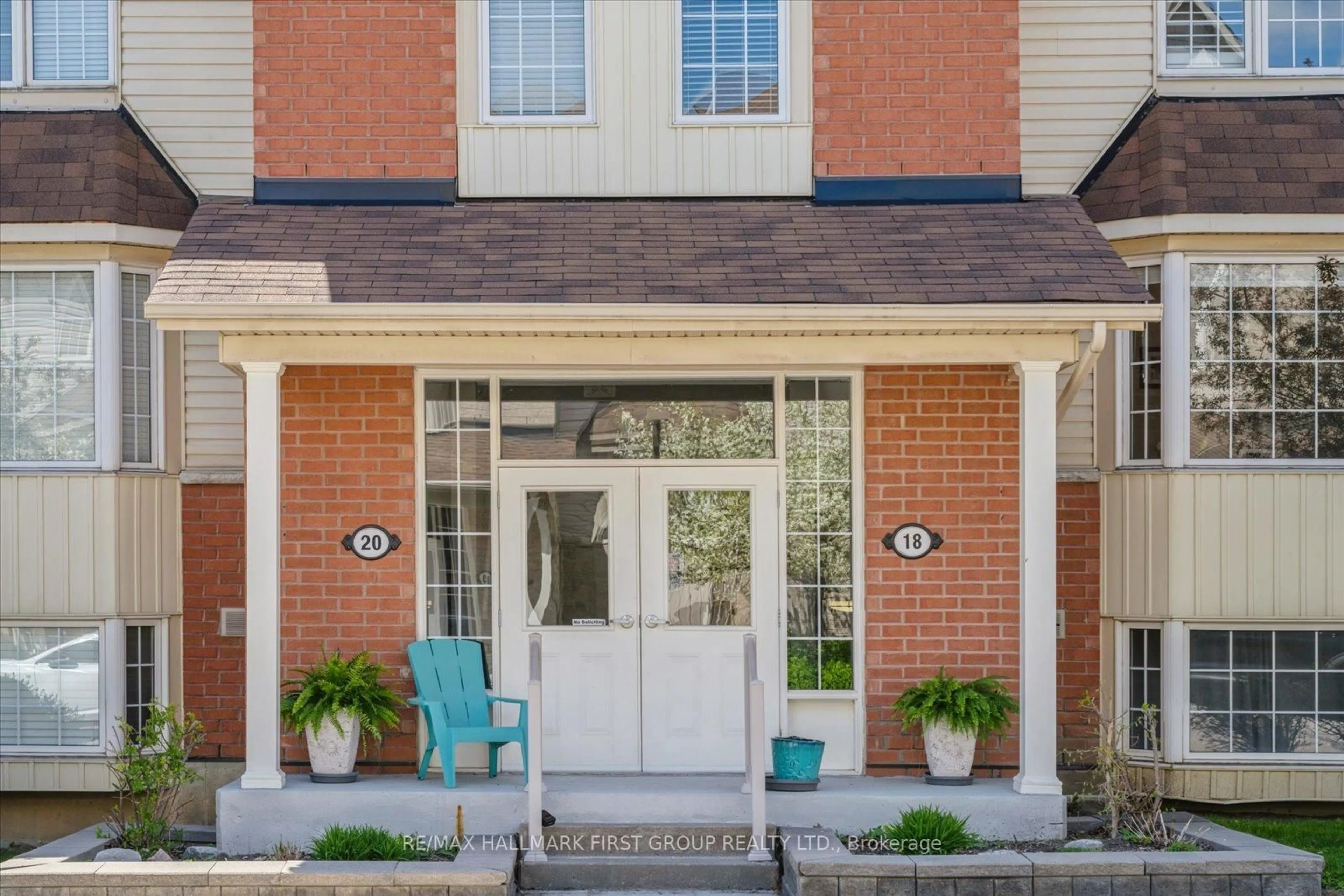 Home with brick exterior material, street for 20 Petra Way #1, Whitby Ontario L1R 0A5