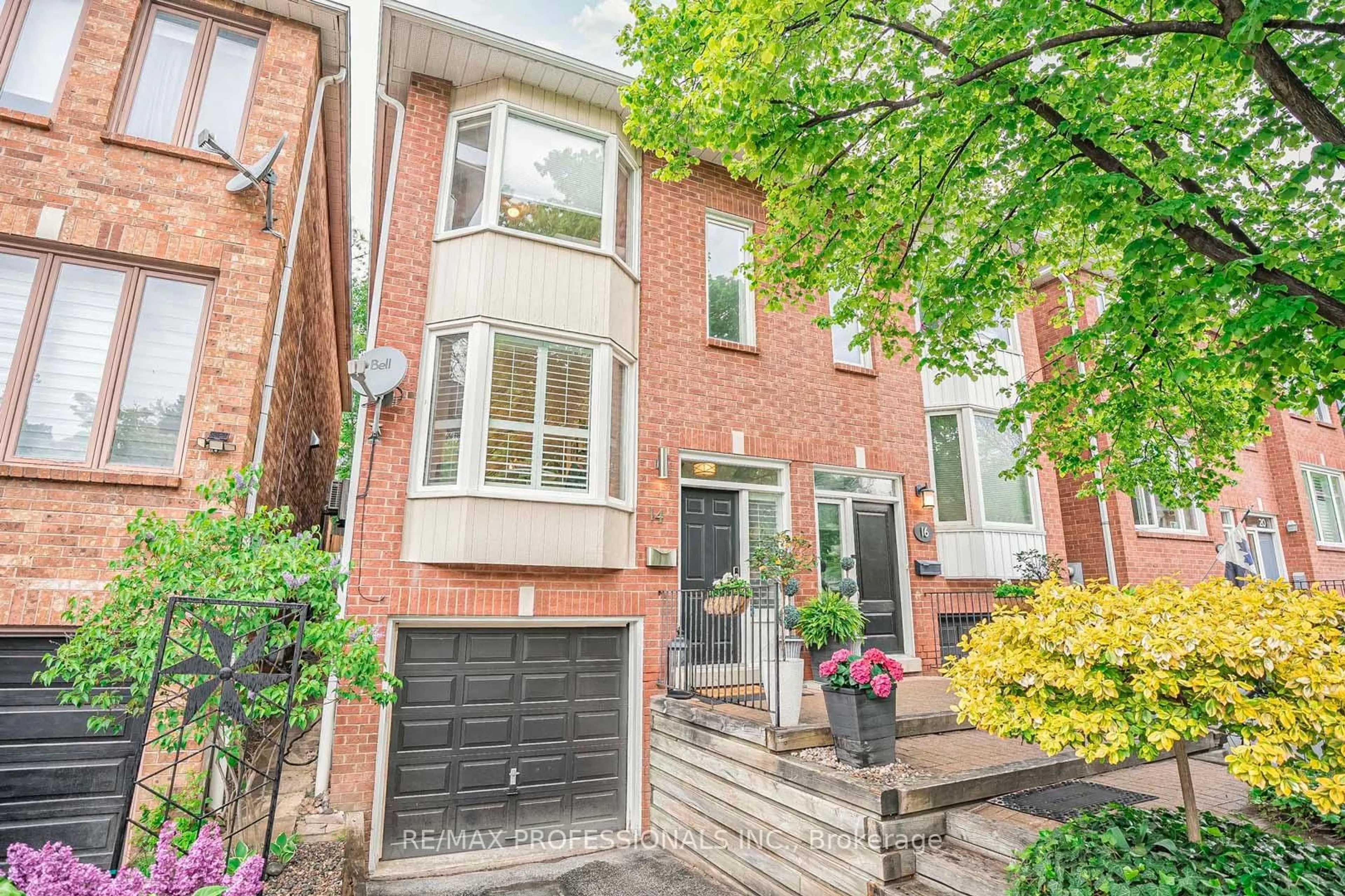 Home with brick exterior material, street for 14 Kellner Crt, Toronto Ontario M4L 3W4