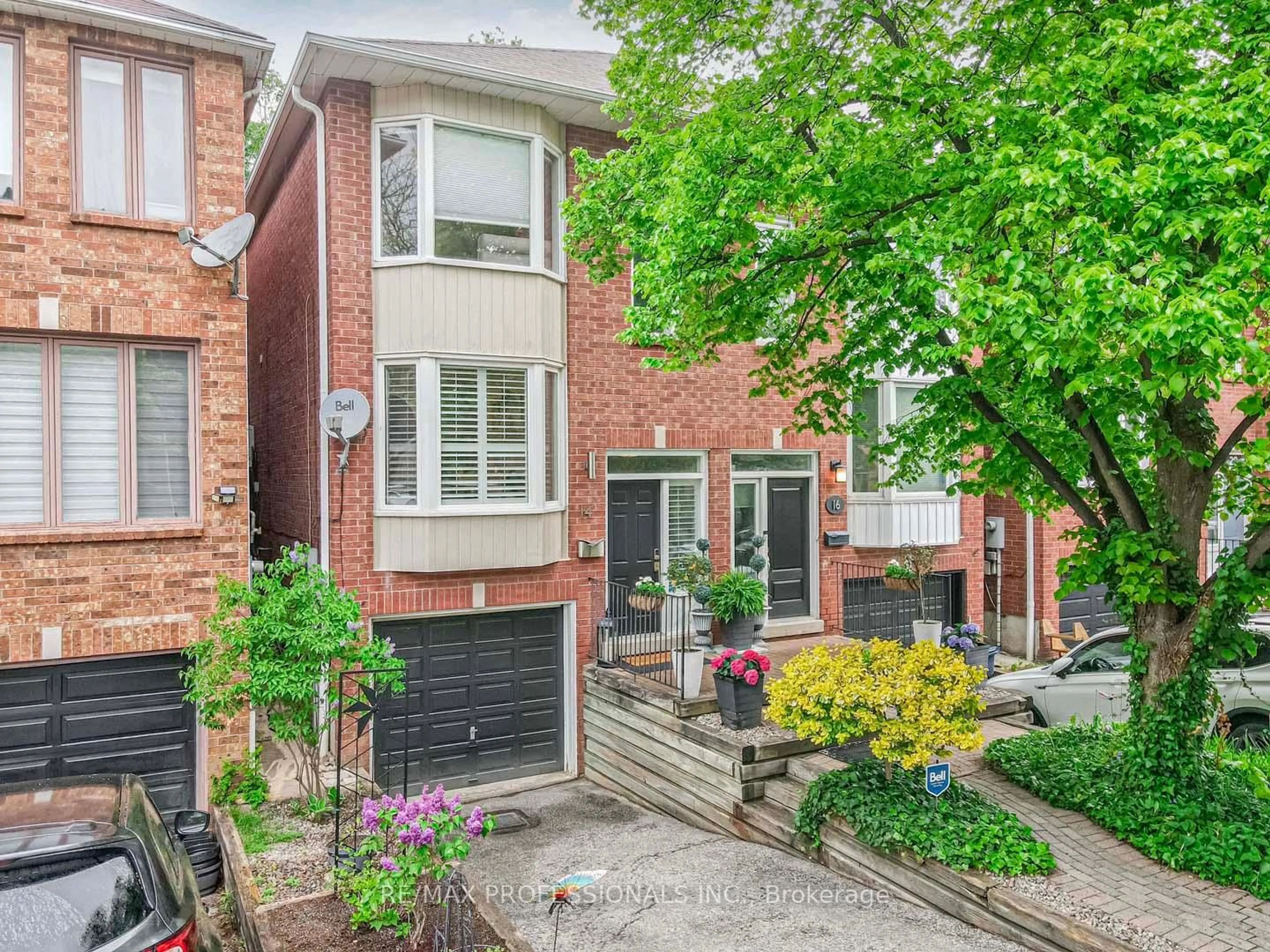 Home with brick exterior material, street for 14 Kellner Crt, Toronto Ontario M4L 3W4
