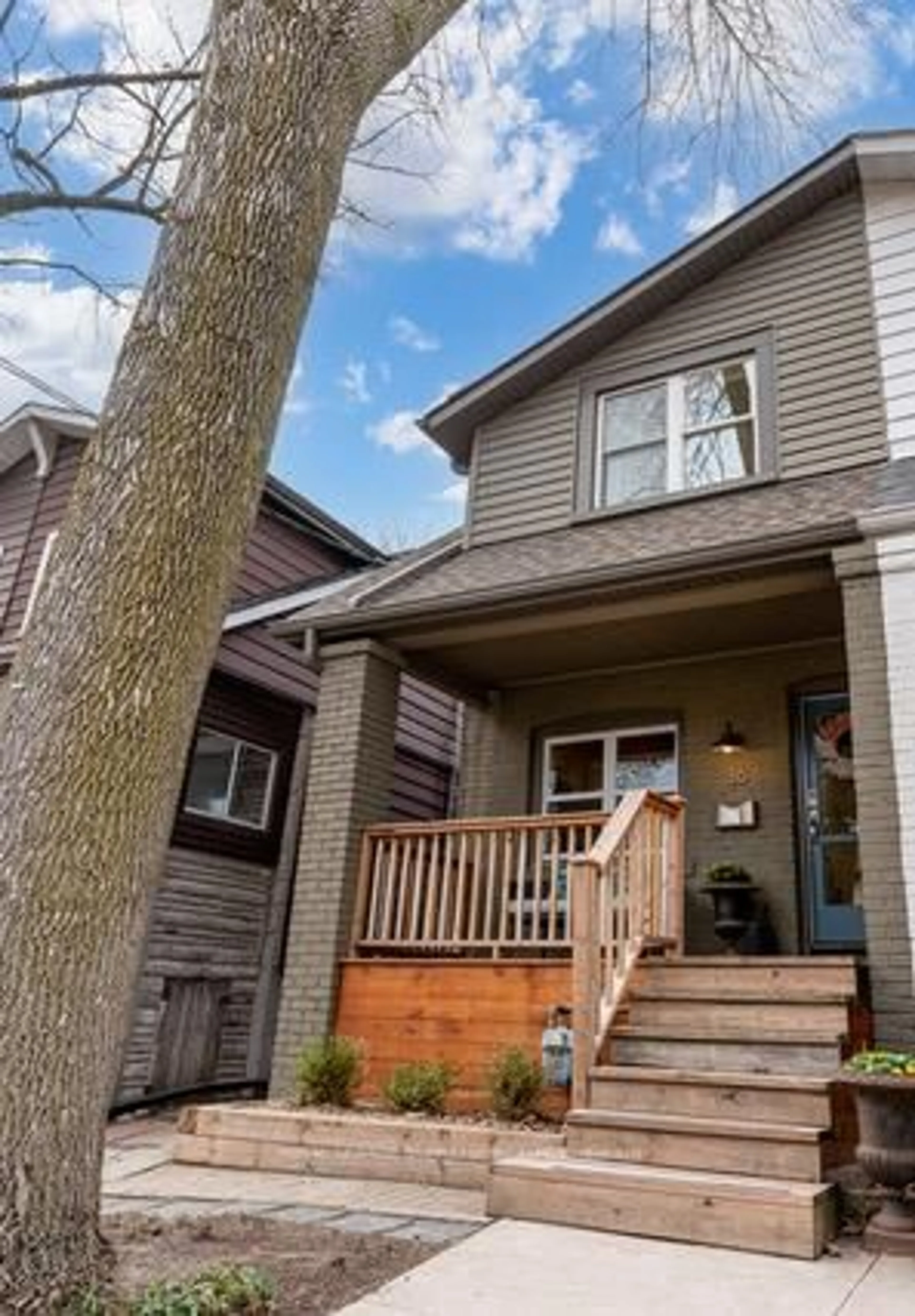 Home with brick exterior material, street for 36 Walpole Ave, Toronto Ontario M4L 2H9