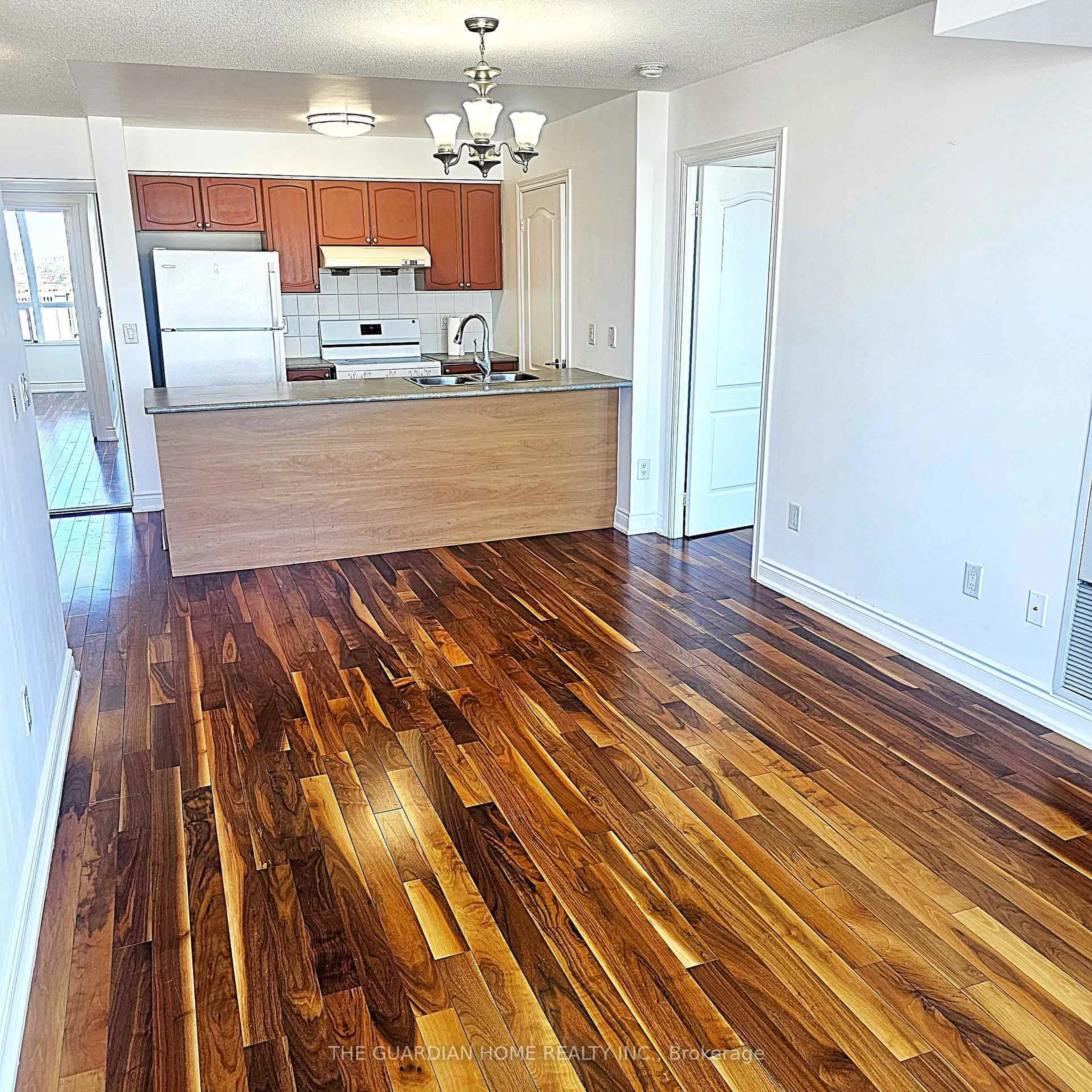 Open concept kitchen, wood/laminate floor for 50 Brian Harrison Way #707, Toronto Ontario M1P 5J4