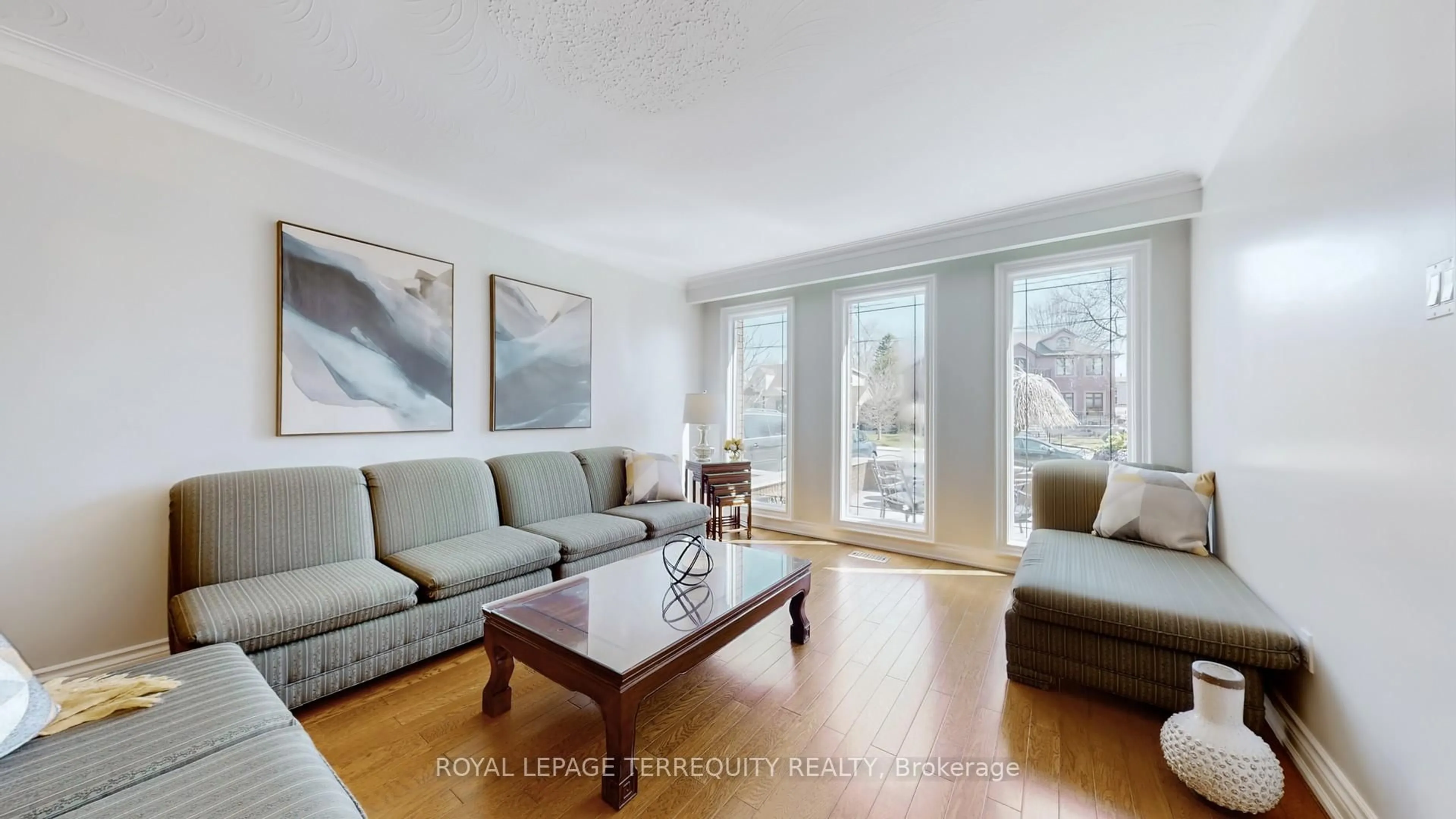 Living room with furniture, wood/laminate floor for 8 Ashall Blvd, Toronto Ontario M4B 3C1