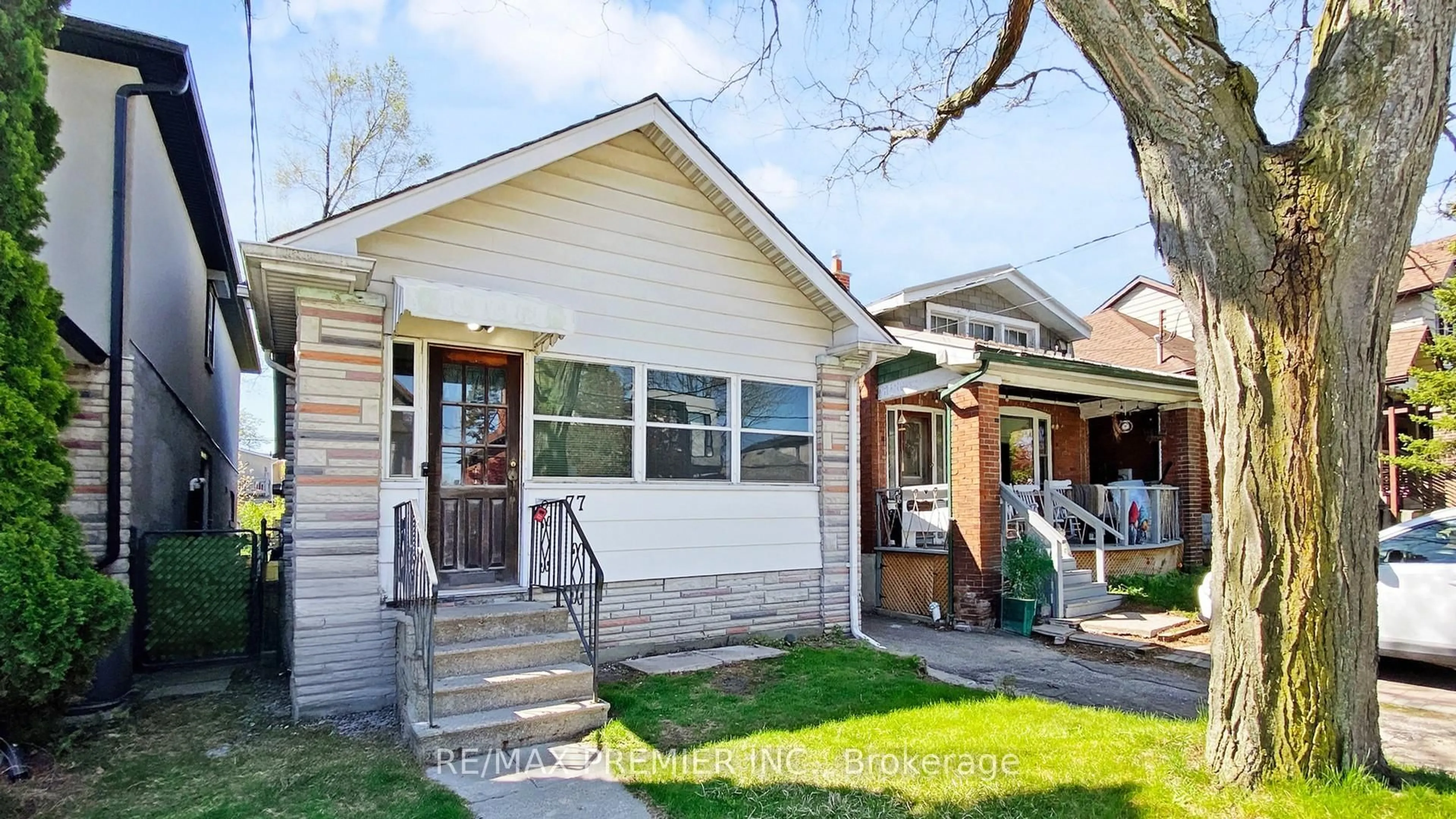 Home with brick exterior material, street for 77 Gatwick Ave, Toronto Ontario M4C 1W4