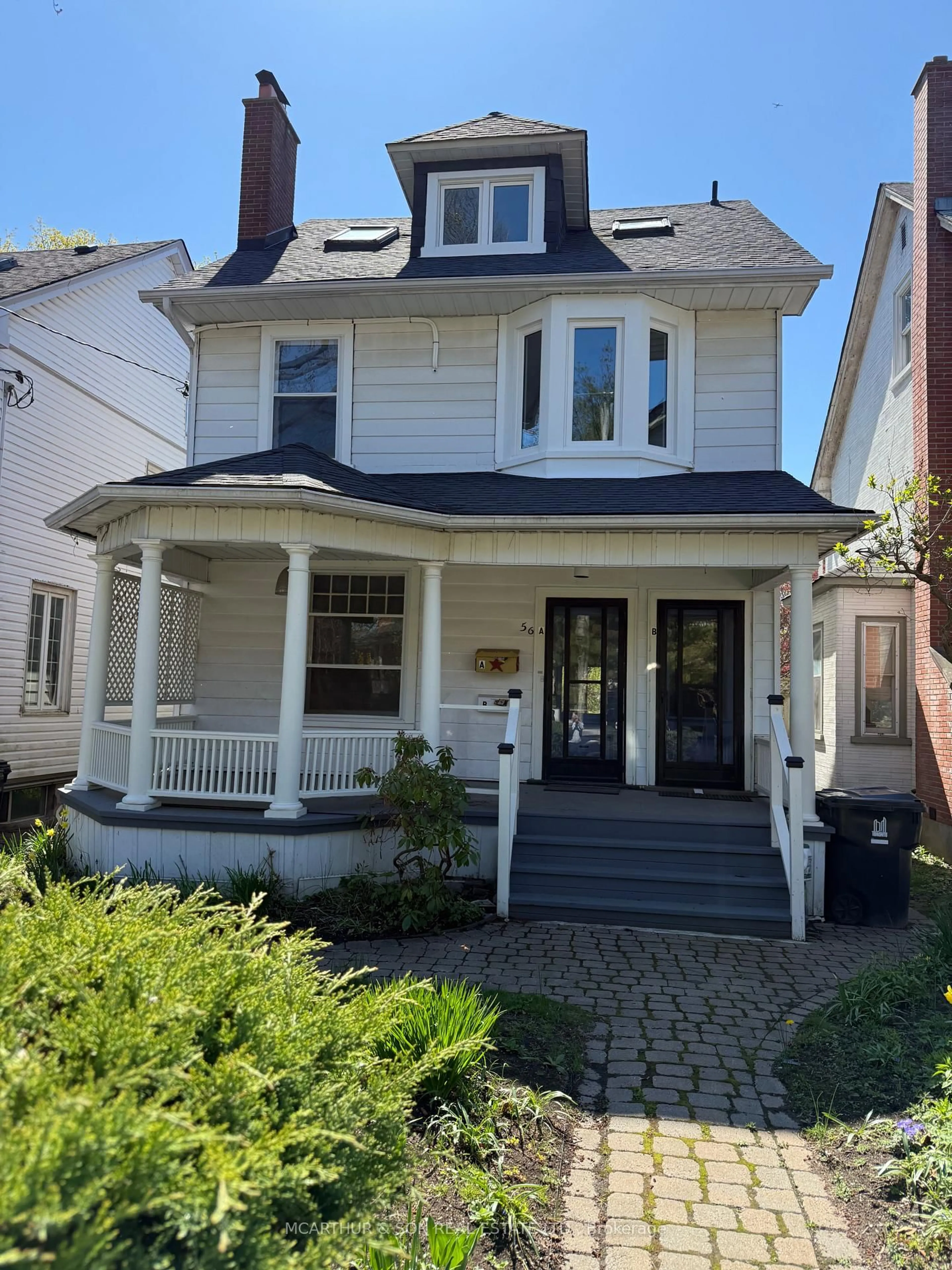 Home with vinyl exterior material, street for 56 Leuty Ave, Toronto Ontario M4E 2R4