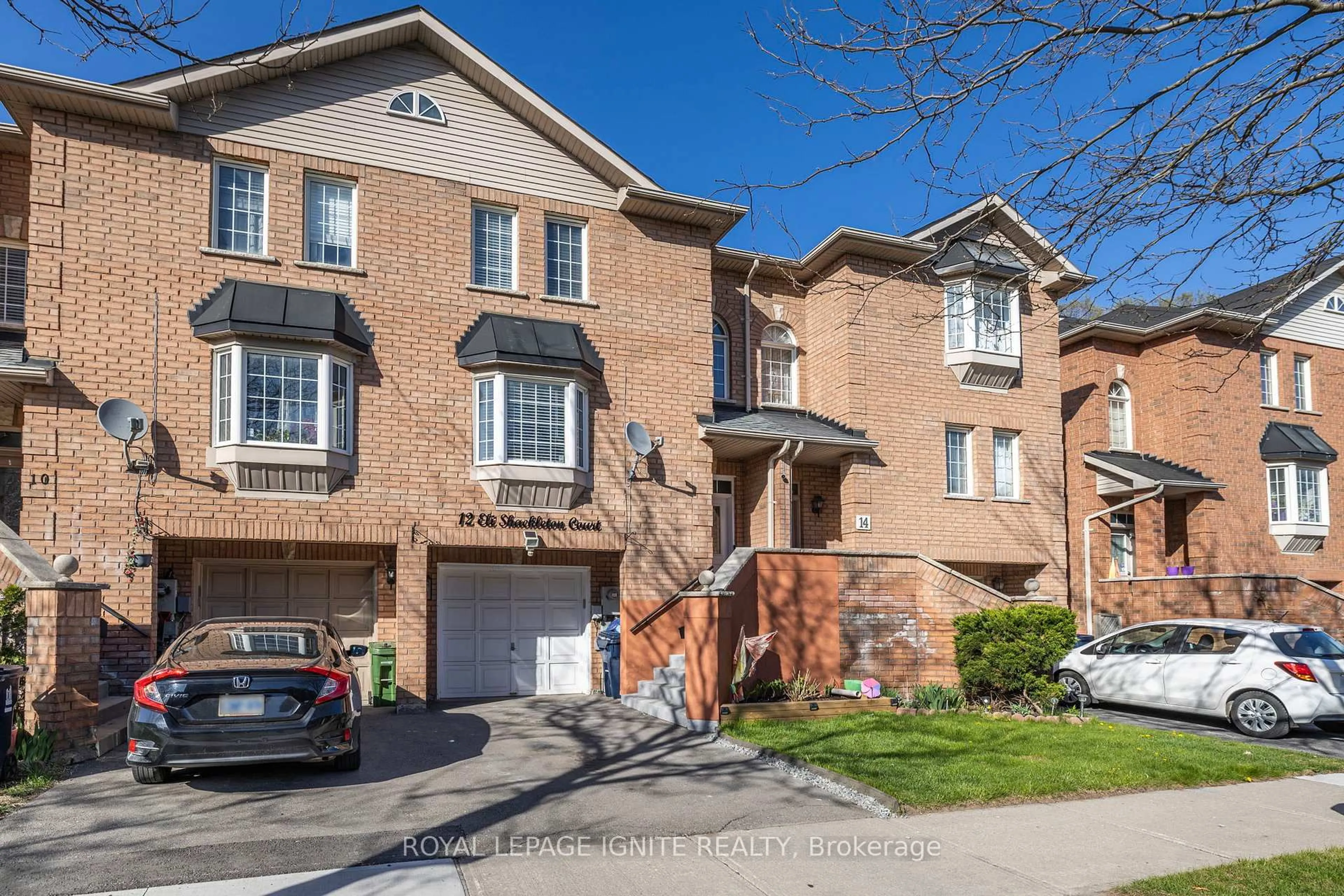 Home with brick exterior material, street for 12 Eli Shackleton Crt, Toronto Ontario M1E 5K3