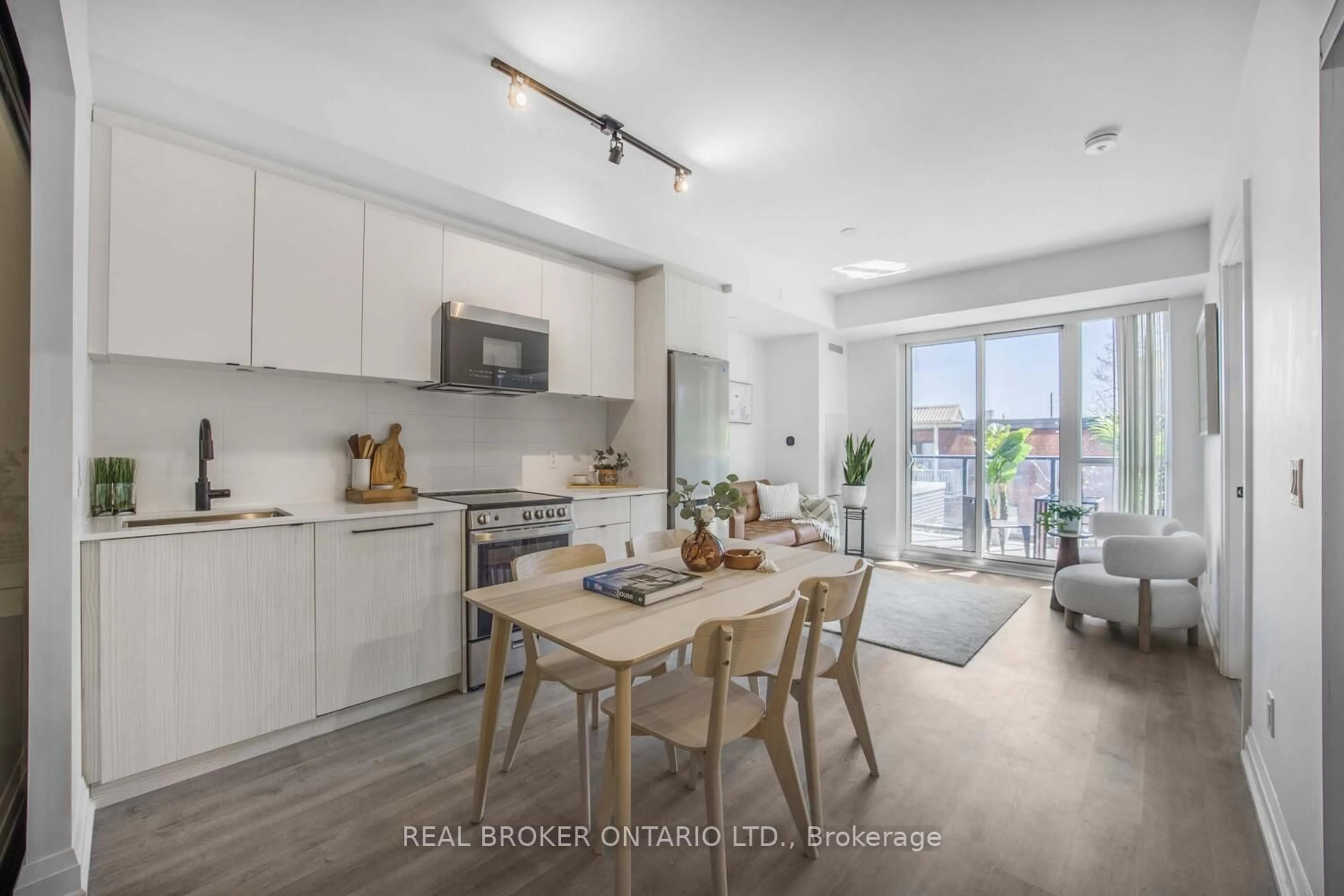 Open concept kitchen, unknown for 2369 Danforth Ave #210, Toronto Ontario M4C 0B1