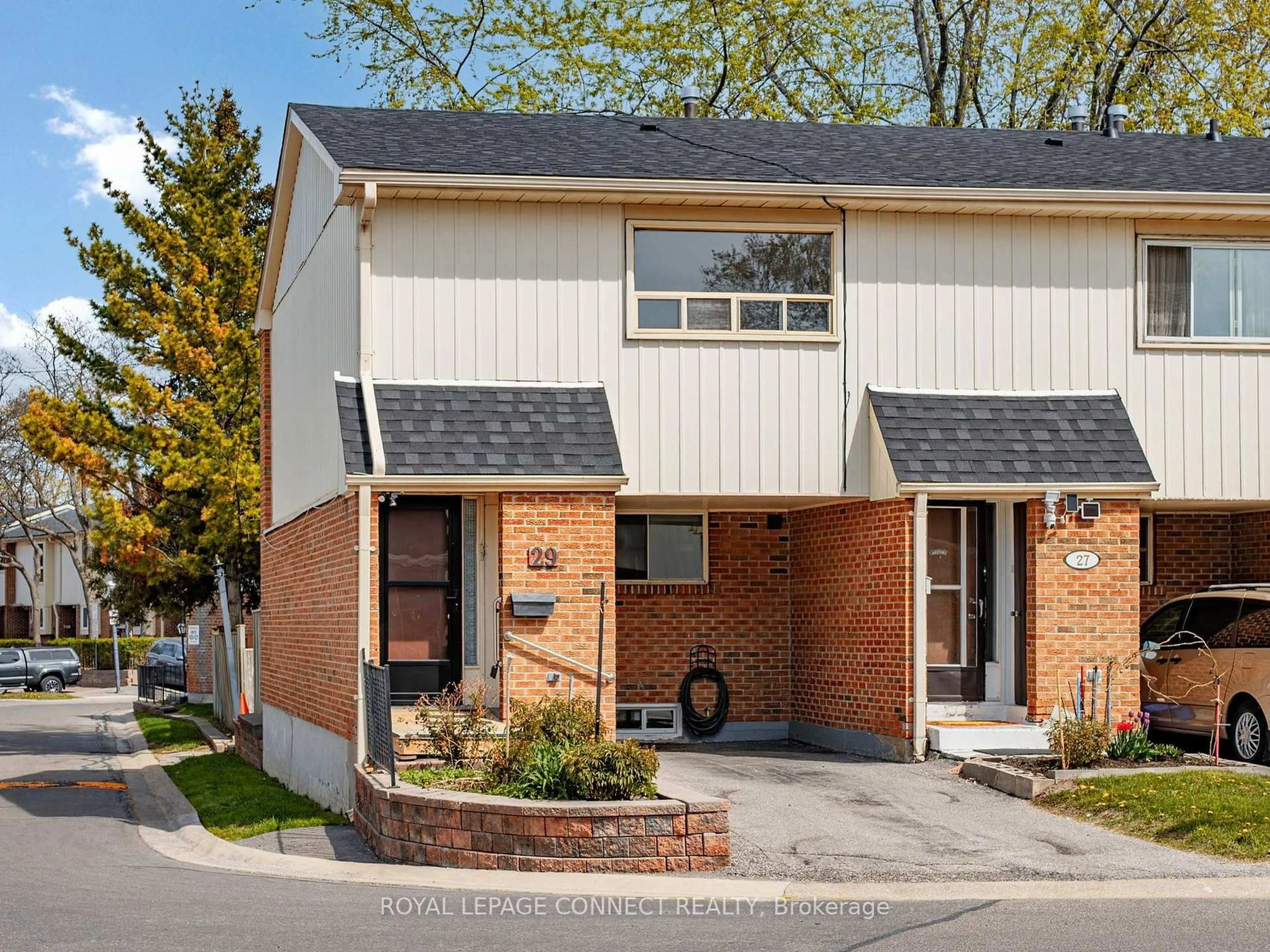 Home with brick exterior material, street for 2451 Bridletowne Circ #29, Toronto Ontario M1W 2Y4