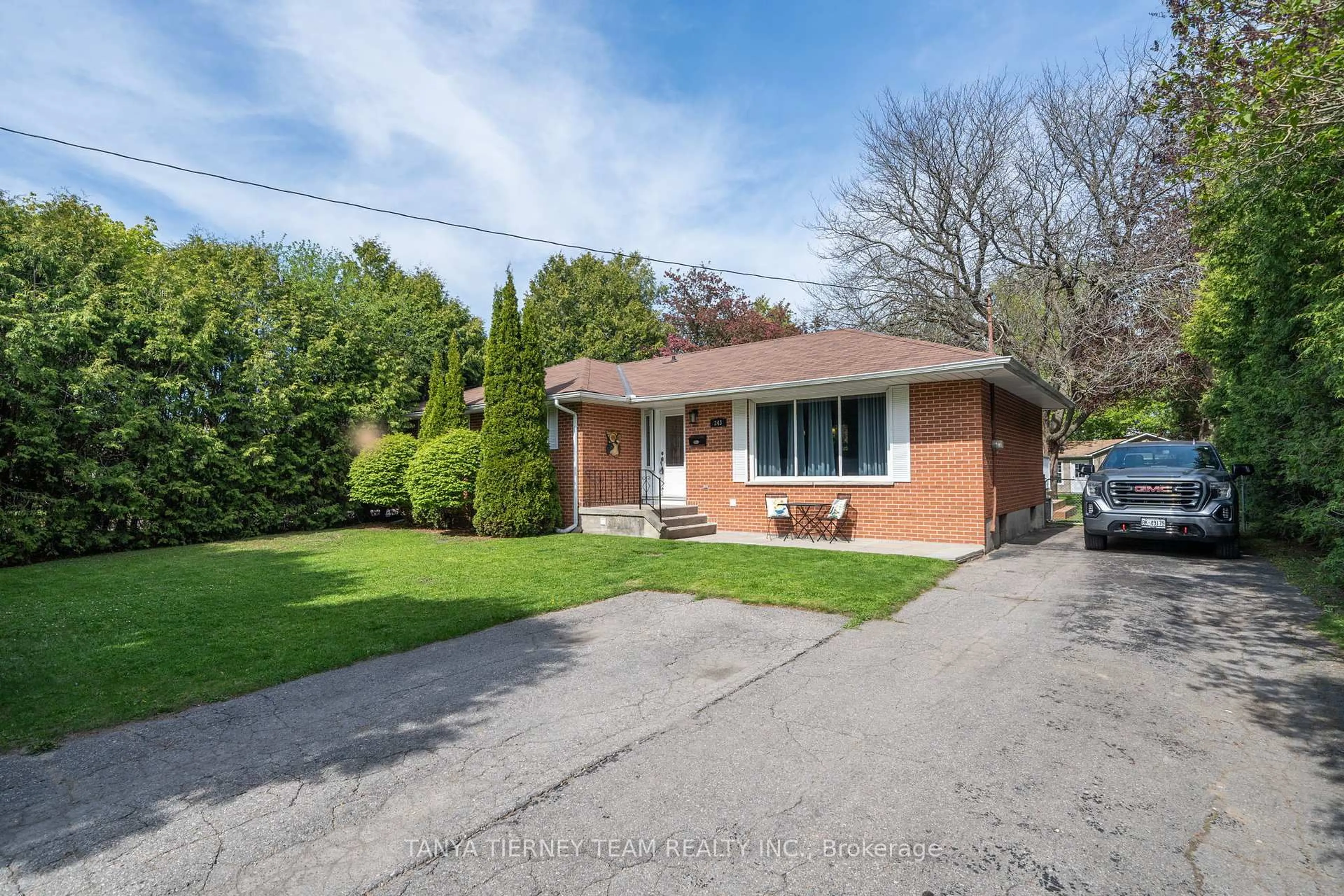 Home with brick exterior material, street for 243 Garrard Rd, Whitby Ontario L1N 3K9