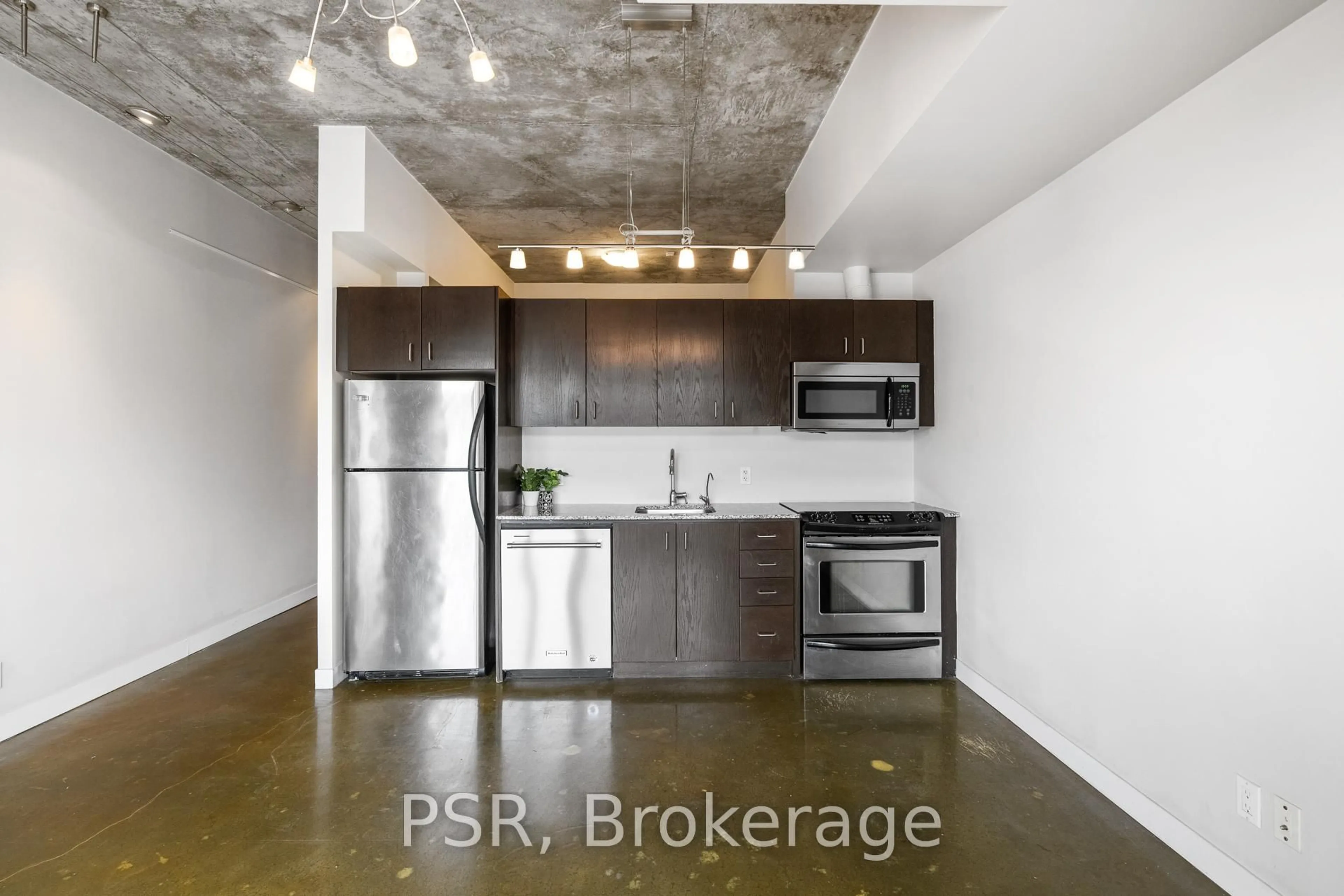Standard kitchen, cement floor for 201 Carlaw Ave #701, Toronto Ontario M4M 2S3