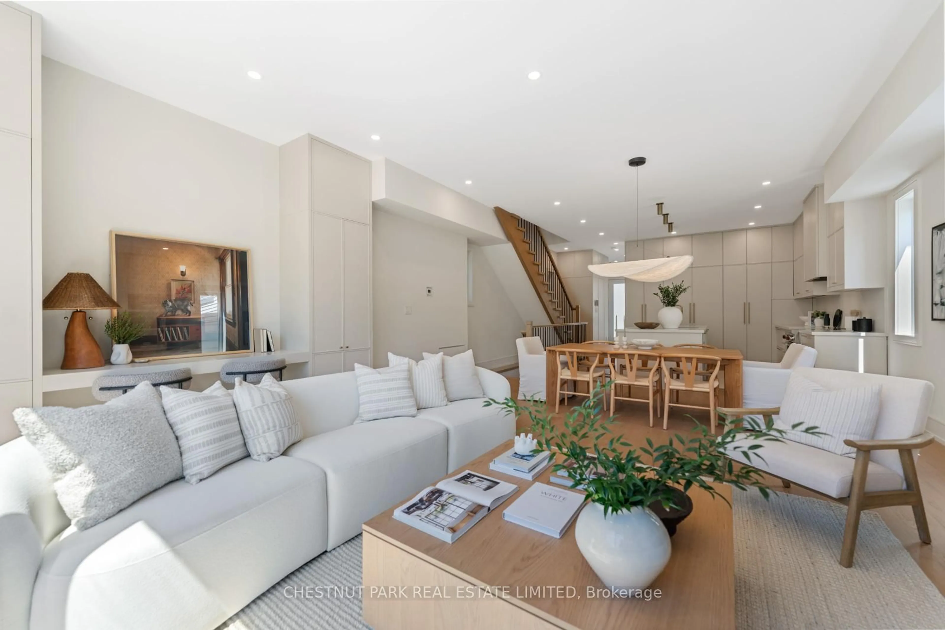 Living room with furniture, unknown for 52 Wheeler Ave, Toronto Ontario M4L 3V2
