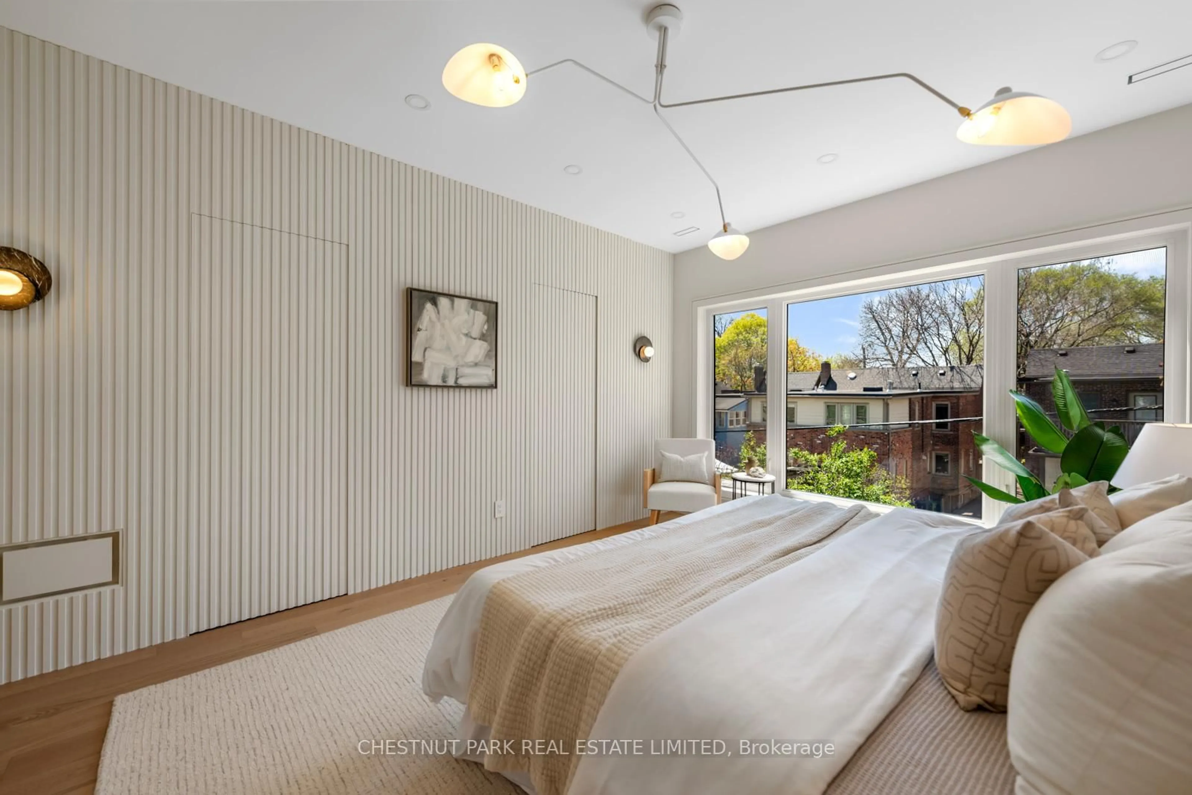 Bedroom with bed, unknown for 52 Wheeler Ave, Toronto Ontario M4L 3V2