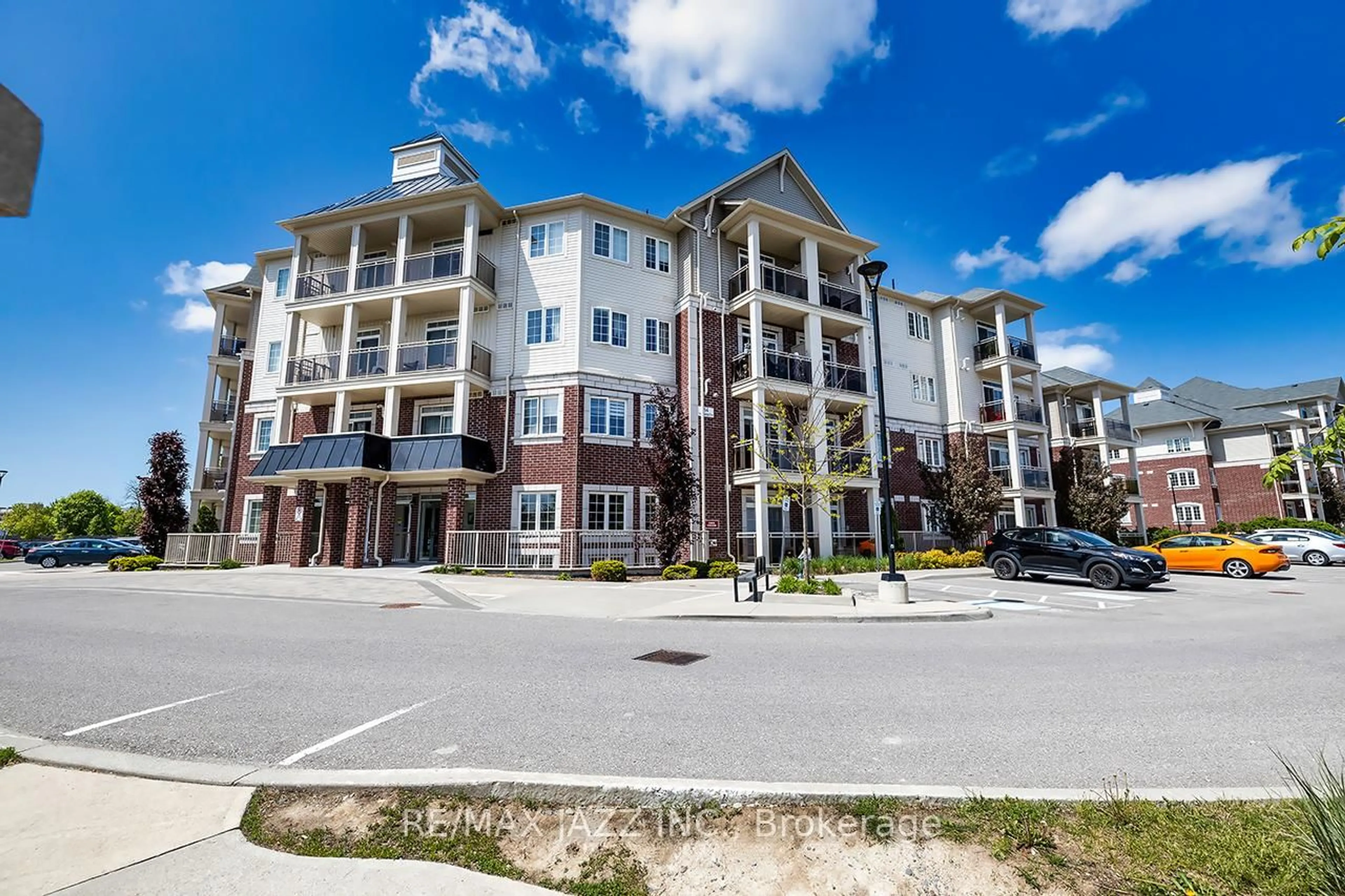 A pic from outside/outdoor area/front of a property/back of a property/a pic from drone, unknown for 80 Aspen Springs Dr #203, Clarington Ontario L1C 0V4