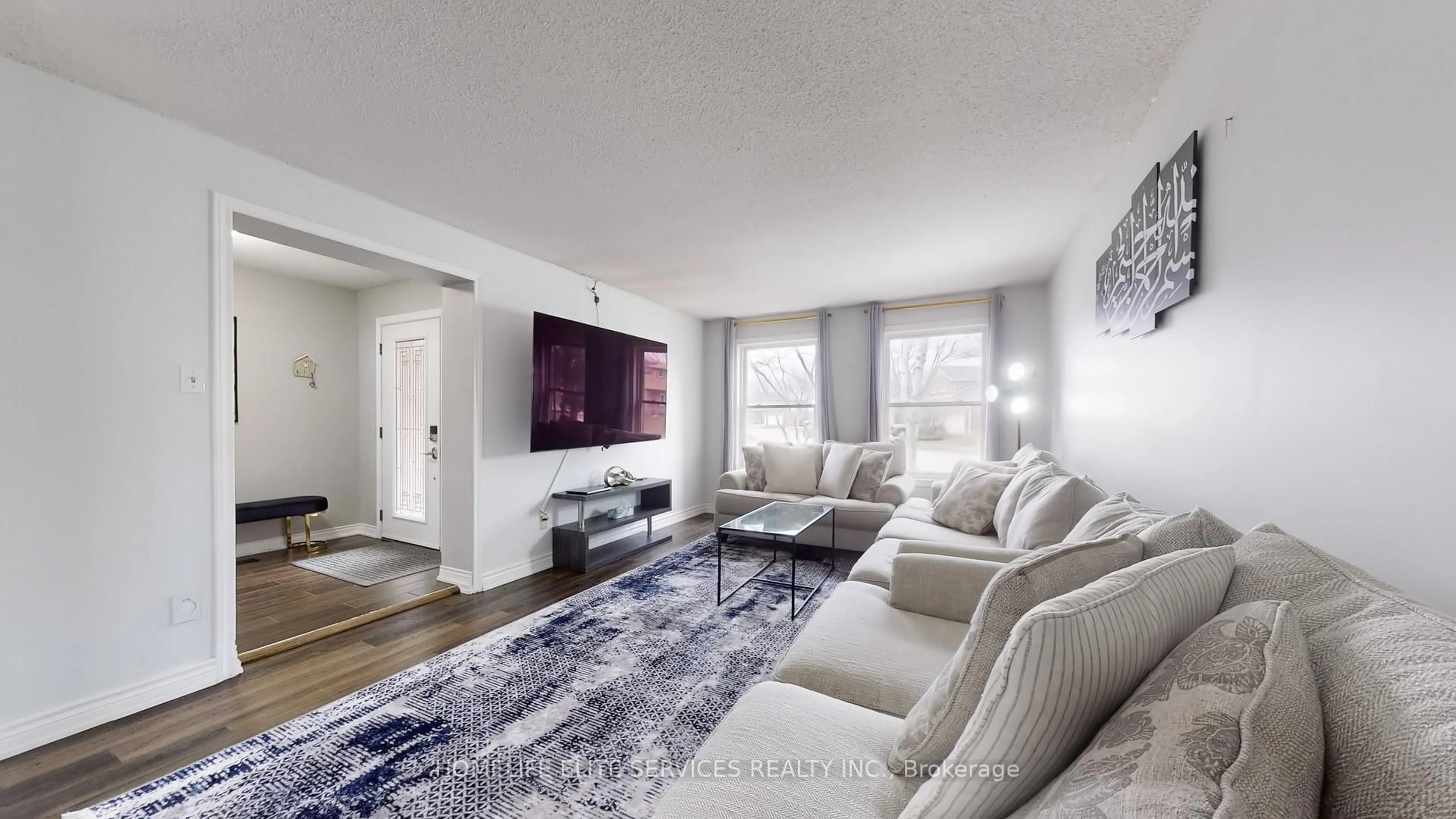 Living room with furniture, unknown for 15 Langmaid Crt, Whitby Ontario L1N 6M7