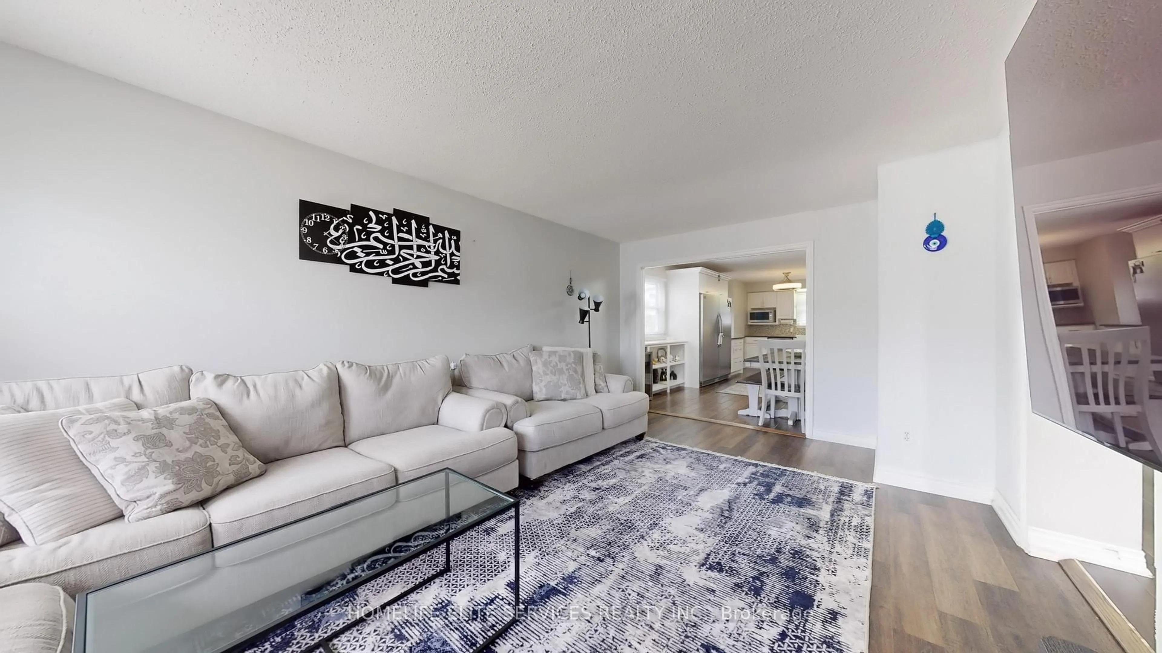 Living room with furniture, unknown for 15 Langmaid Crt, Whitby Ontario L1N 6M7