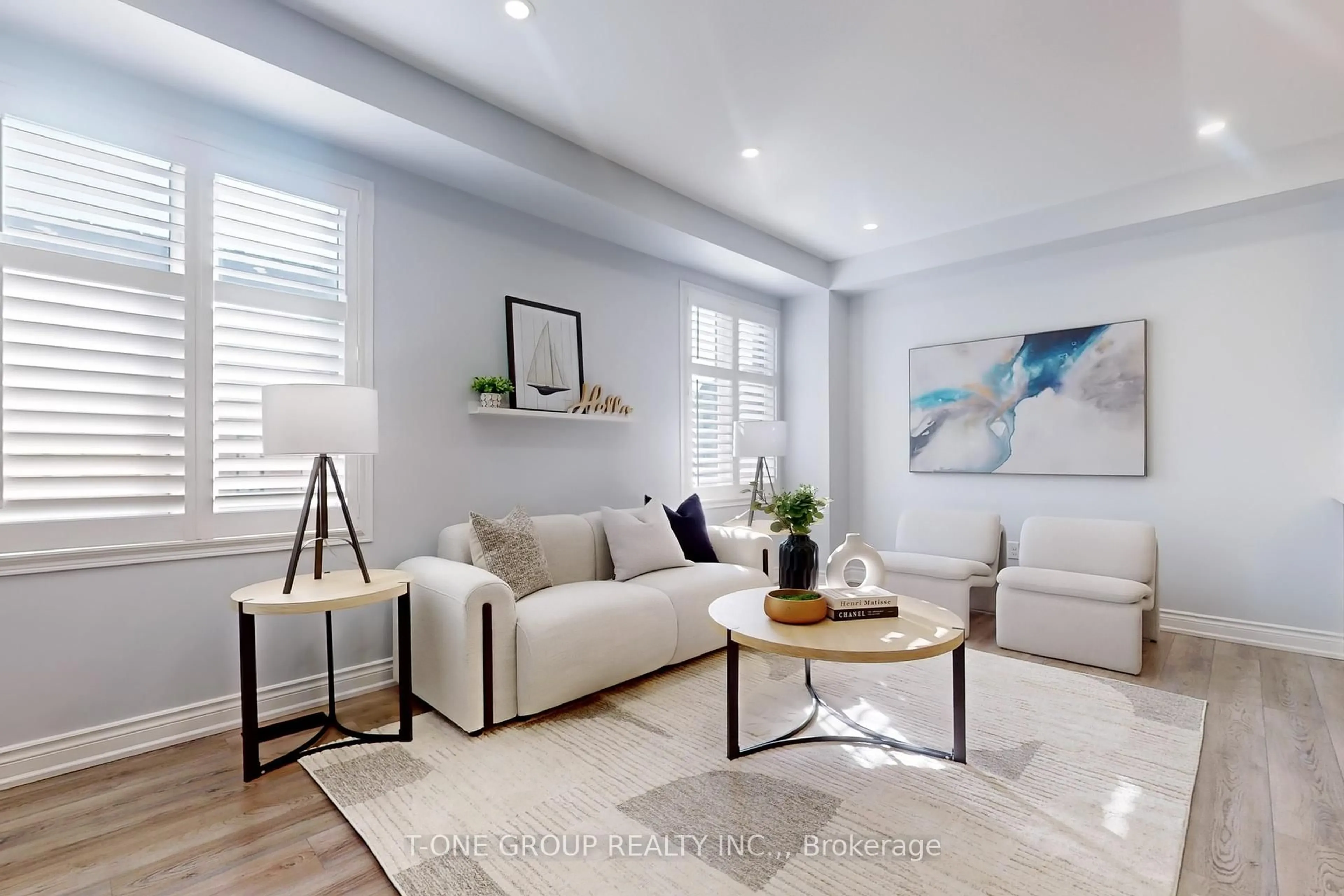 Living room with furniture, wood/laminate floor for 37 Quarrie Lane, Ajax Ontario L1T 0N1