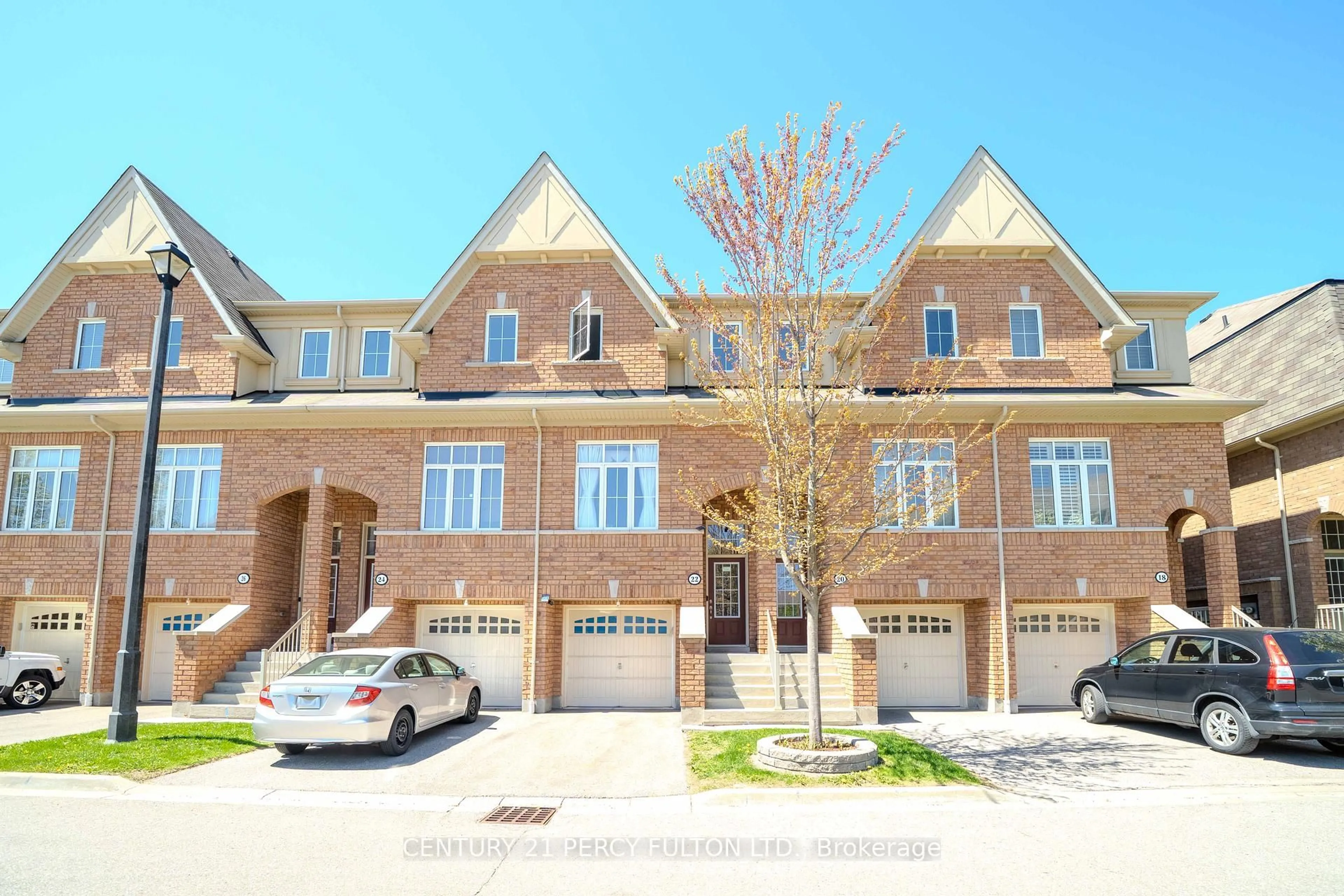 Home with brick exterior material, street for 22 Burtonbury Lane #11, Ajax Ontario L1Z 0C9