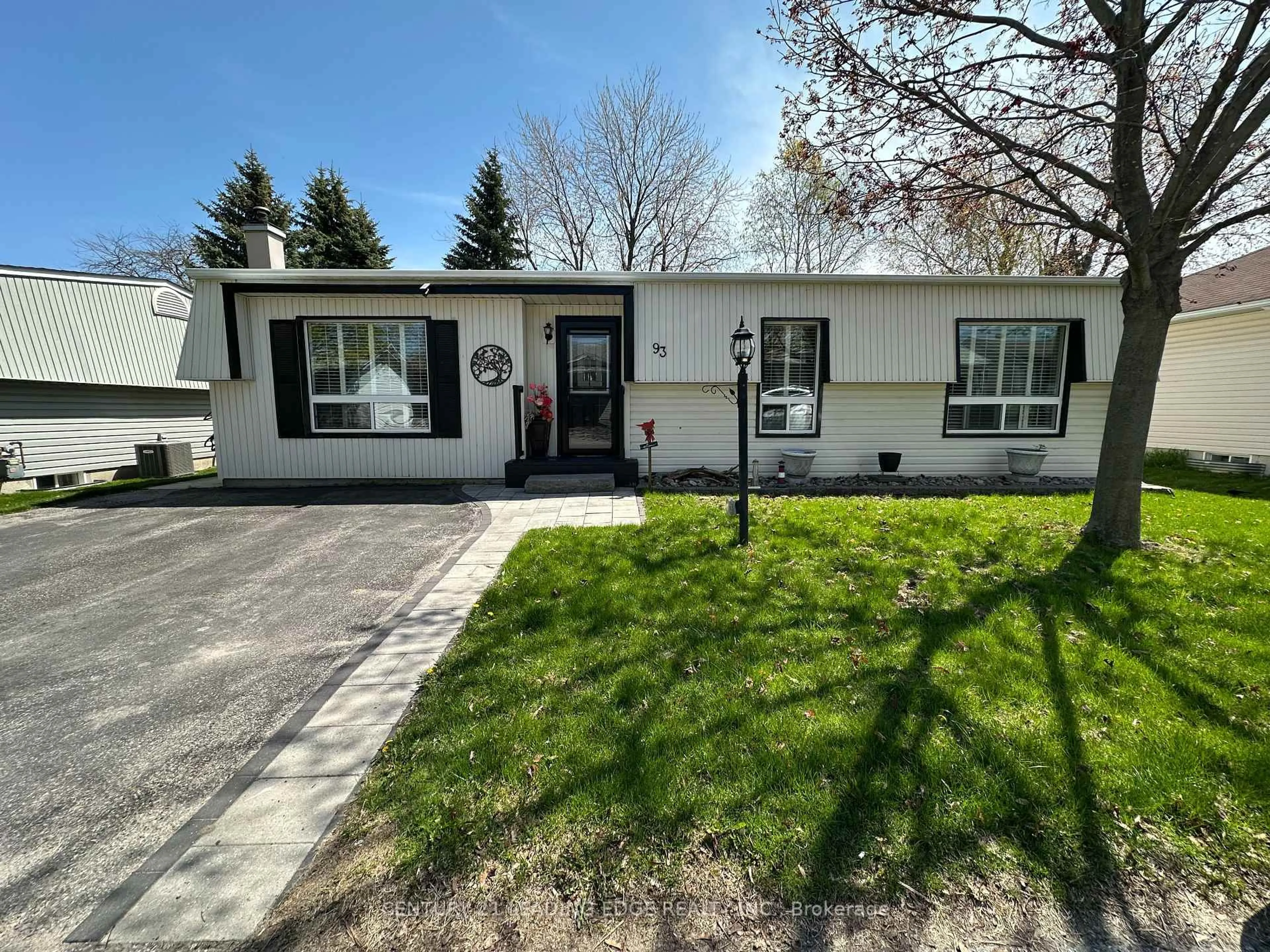 Home with vinyl exterior material, street for 93 Wilmot Tr, Clarington Ontario L1B 1A7