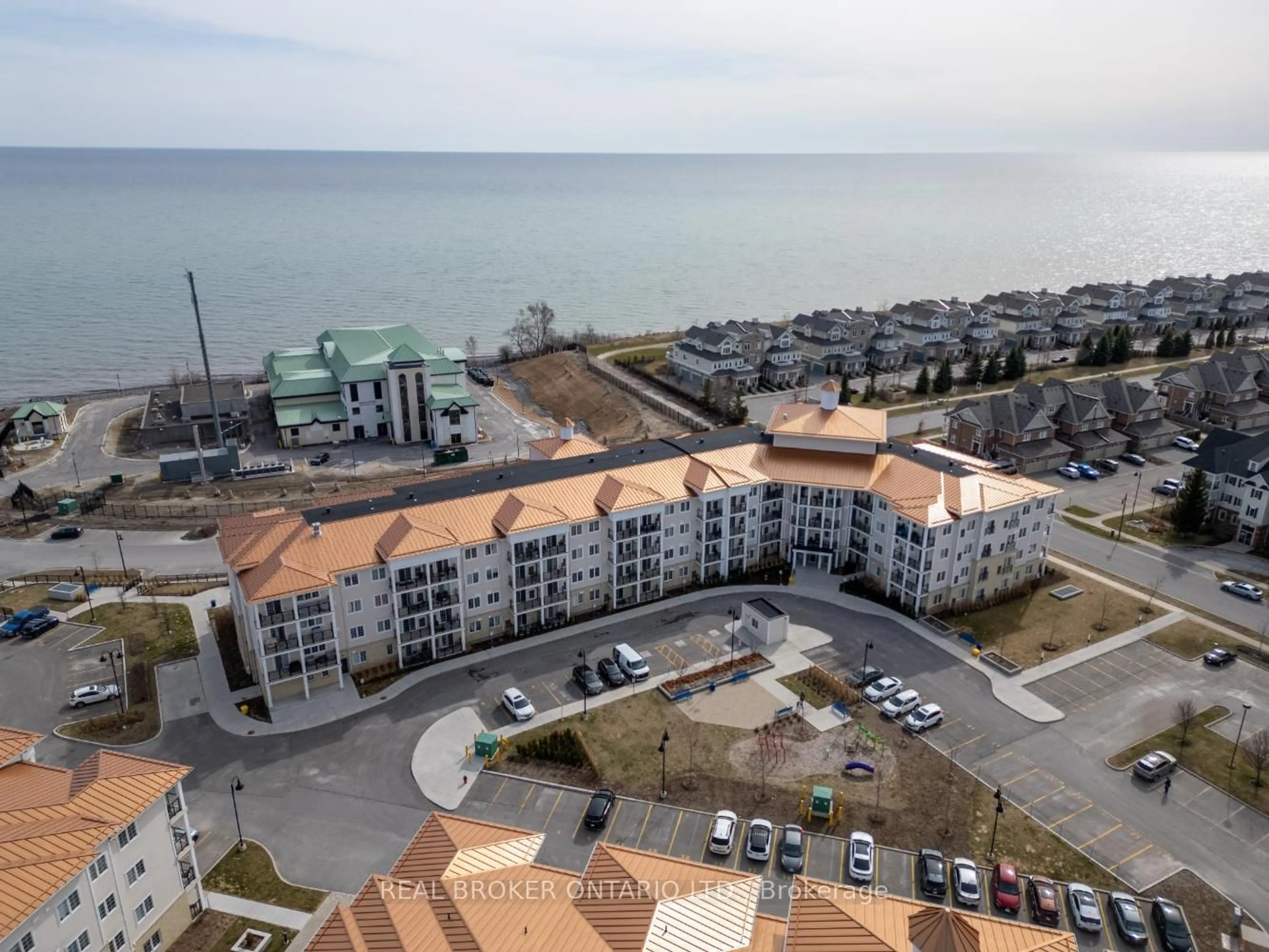 A pic from outside/outdoor area/front of a property/back of a property/a pic from drone, unknown for 50 Lakebreeze Dr #427, Clarington Ontario L1B 0V9